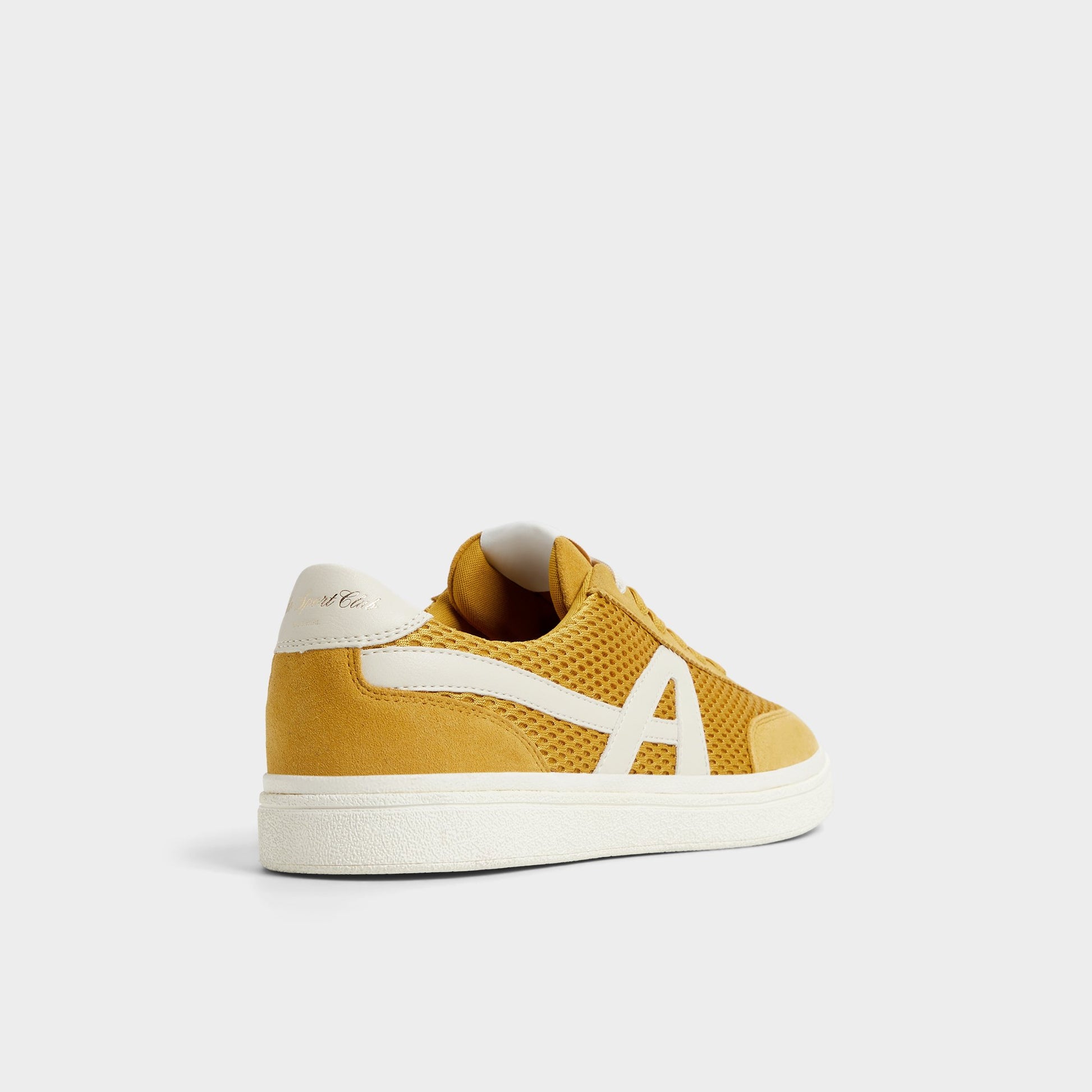 Three-quarter angle of Medium Yellow Clubtrainer Low top sneaker's back side