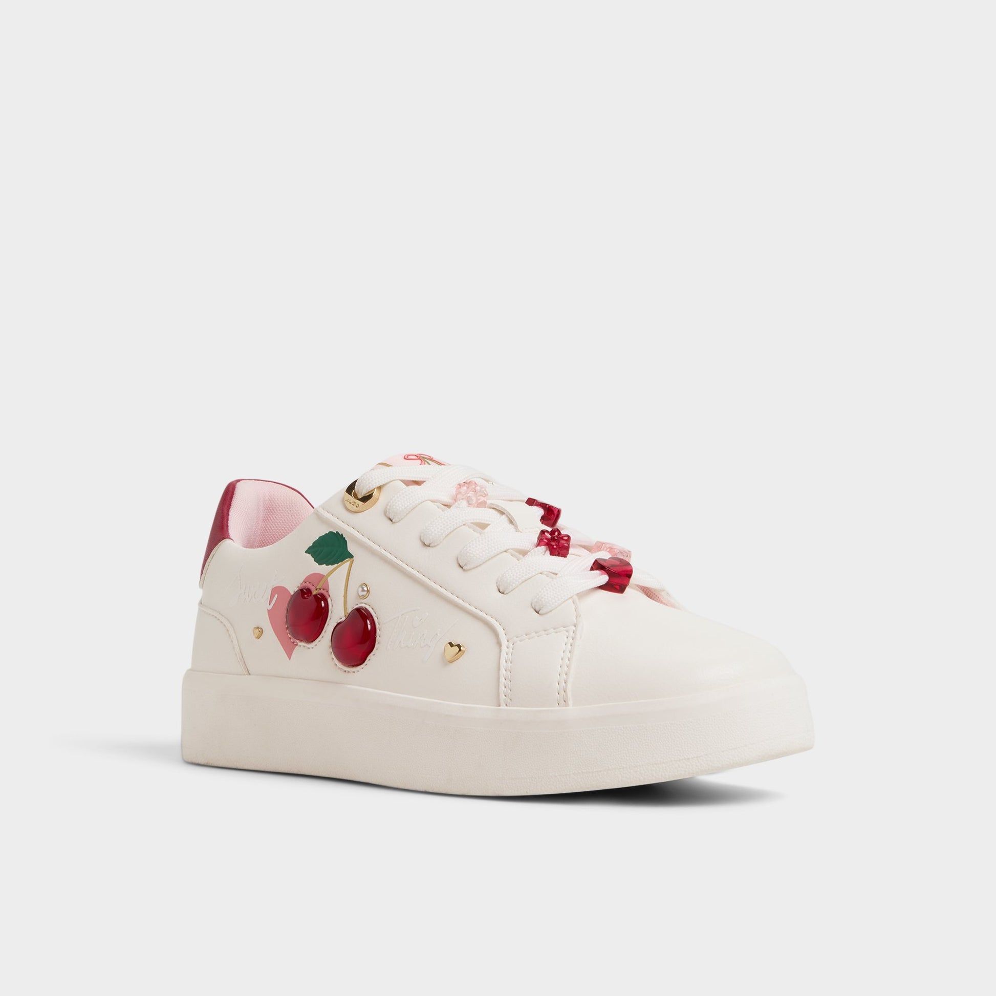 Three-quarter angle of White Cherrylove Low top sneaker's front side