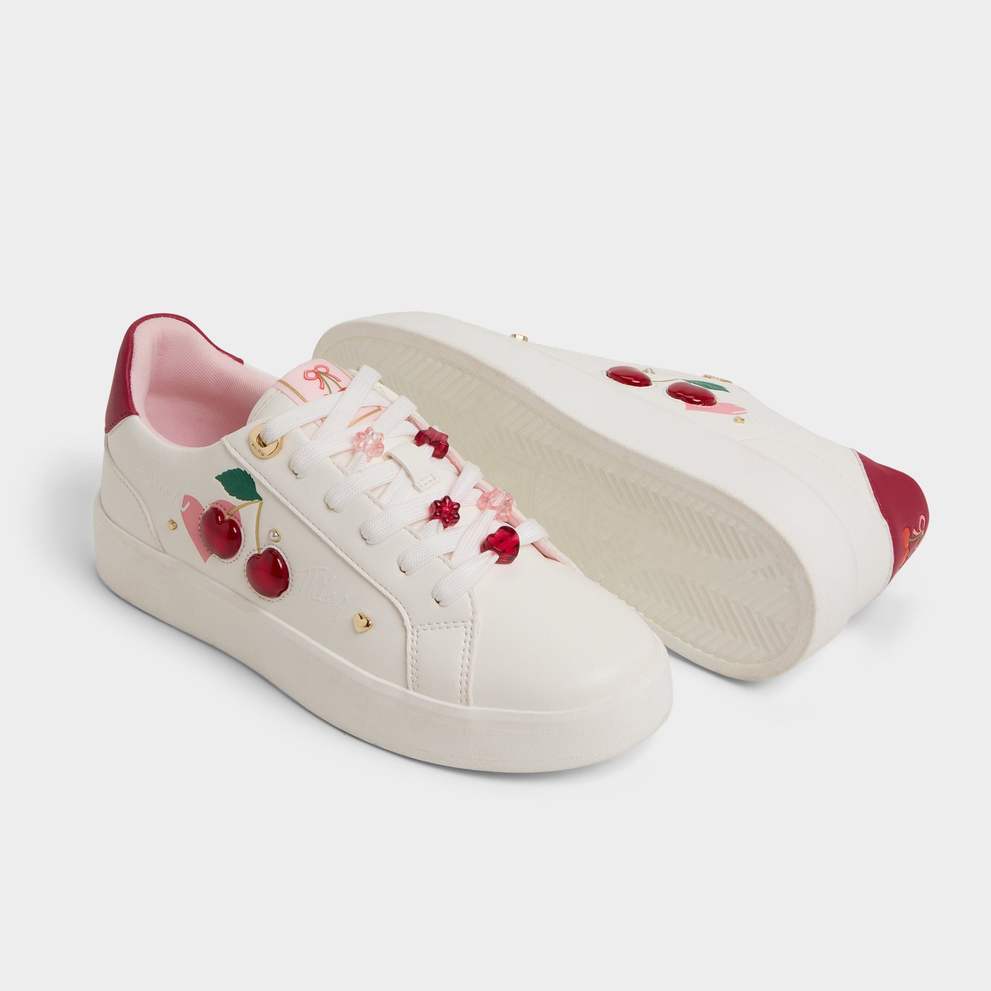 Highlighted view of a pair of White Cherrylove Low top sneakers