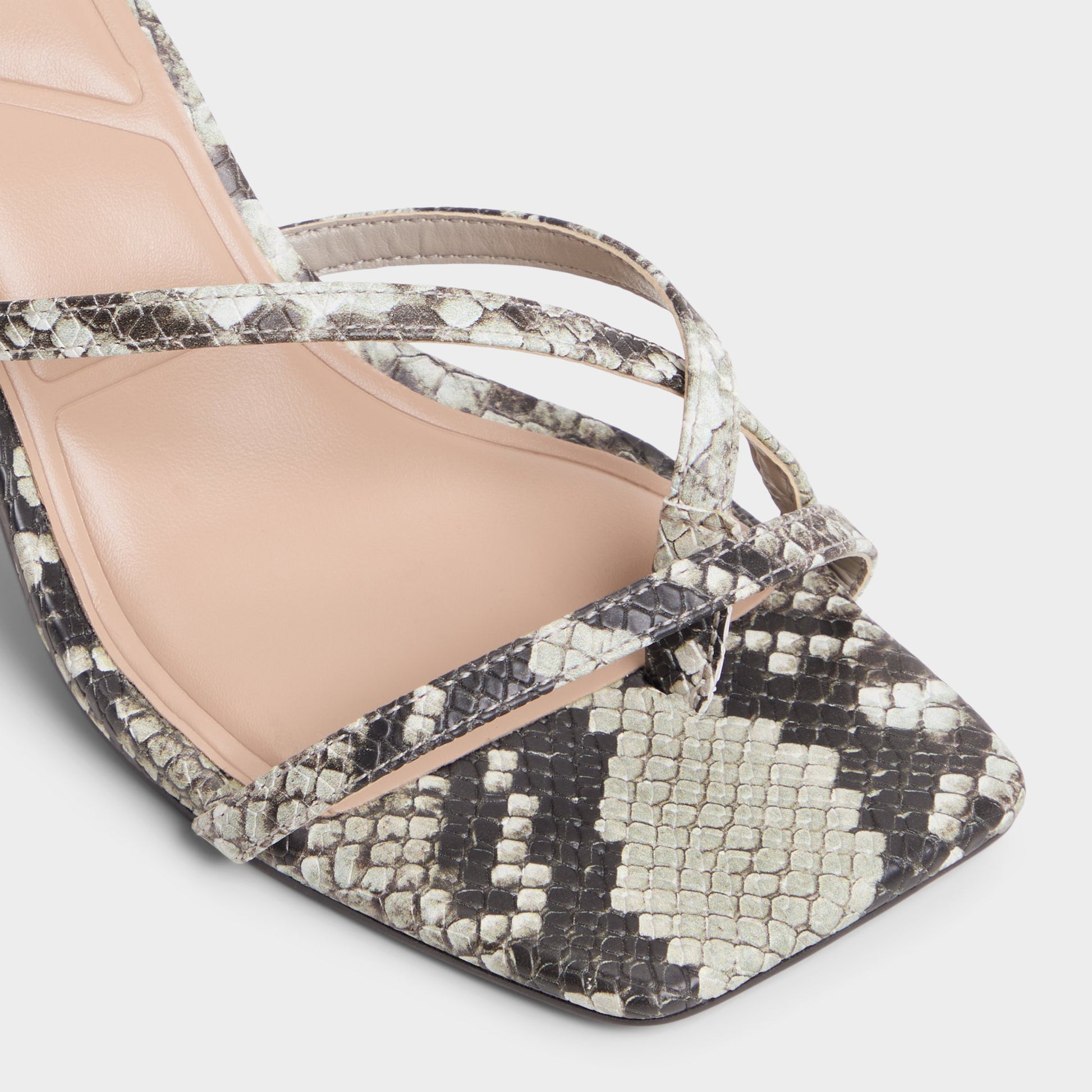 Close-up of the White/Black Calypsa Strappy heeled sandal