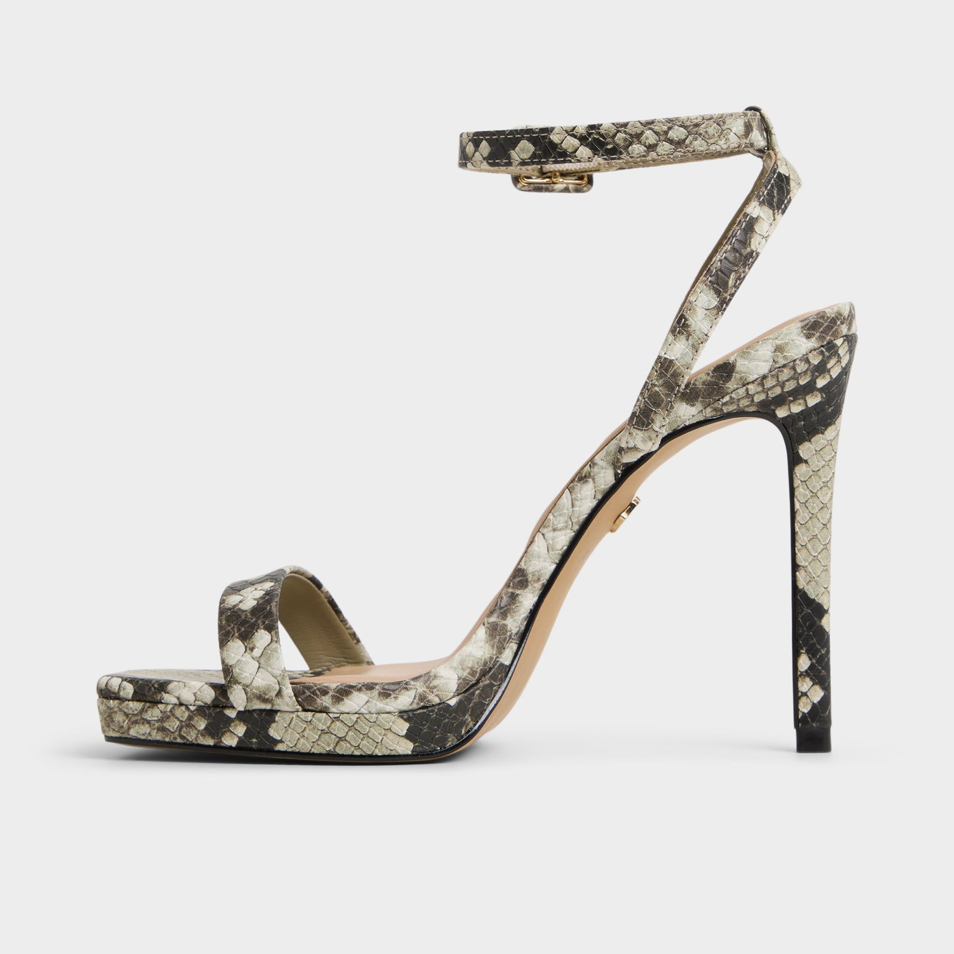 Side view of White/Black Kaathy Strappy heeled sandal