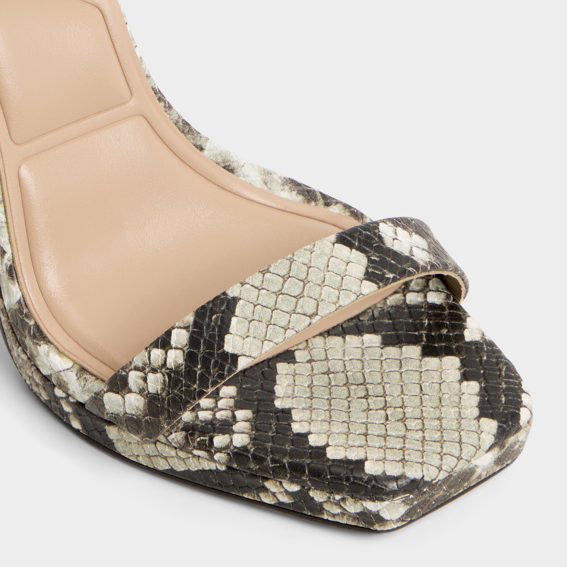 Close-up of the White/Black Kaathy Strappy heeled sandal