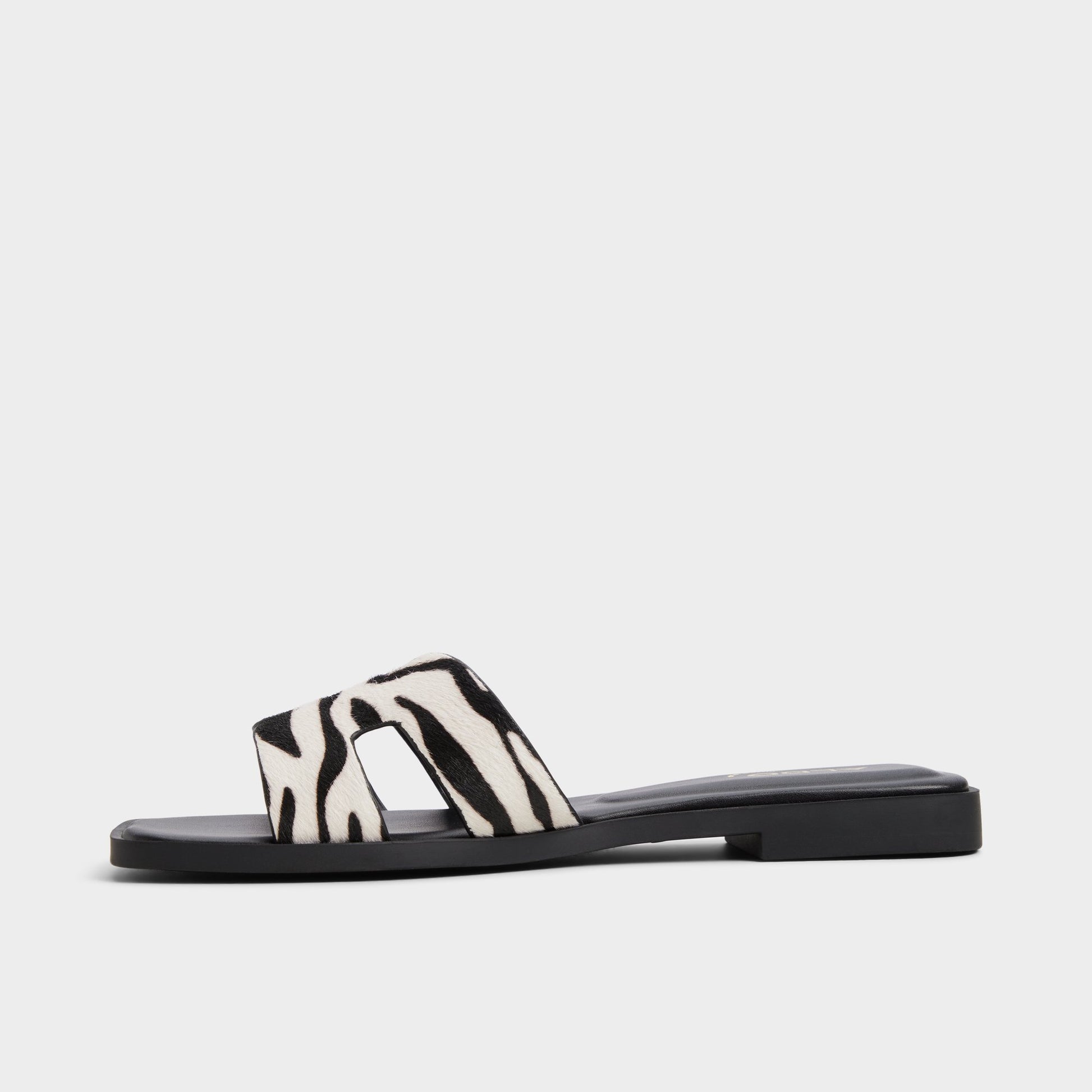 Side view of White/Black Itsandal Slide sandal