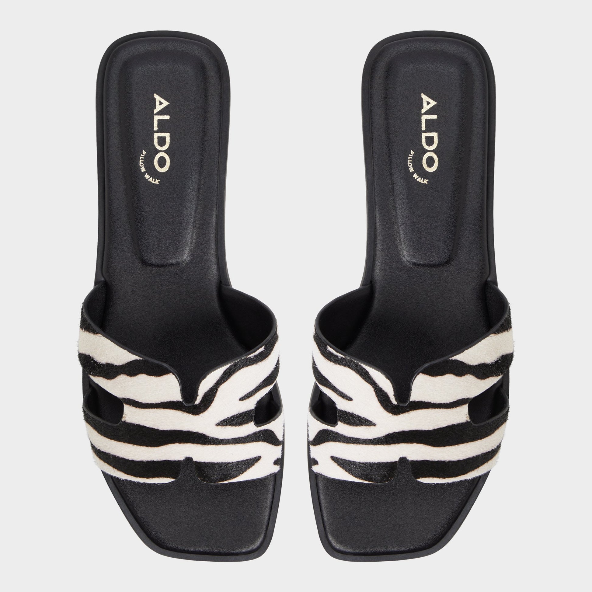 Top-down view of the White/Black Itsandal Slide sandal