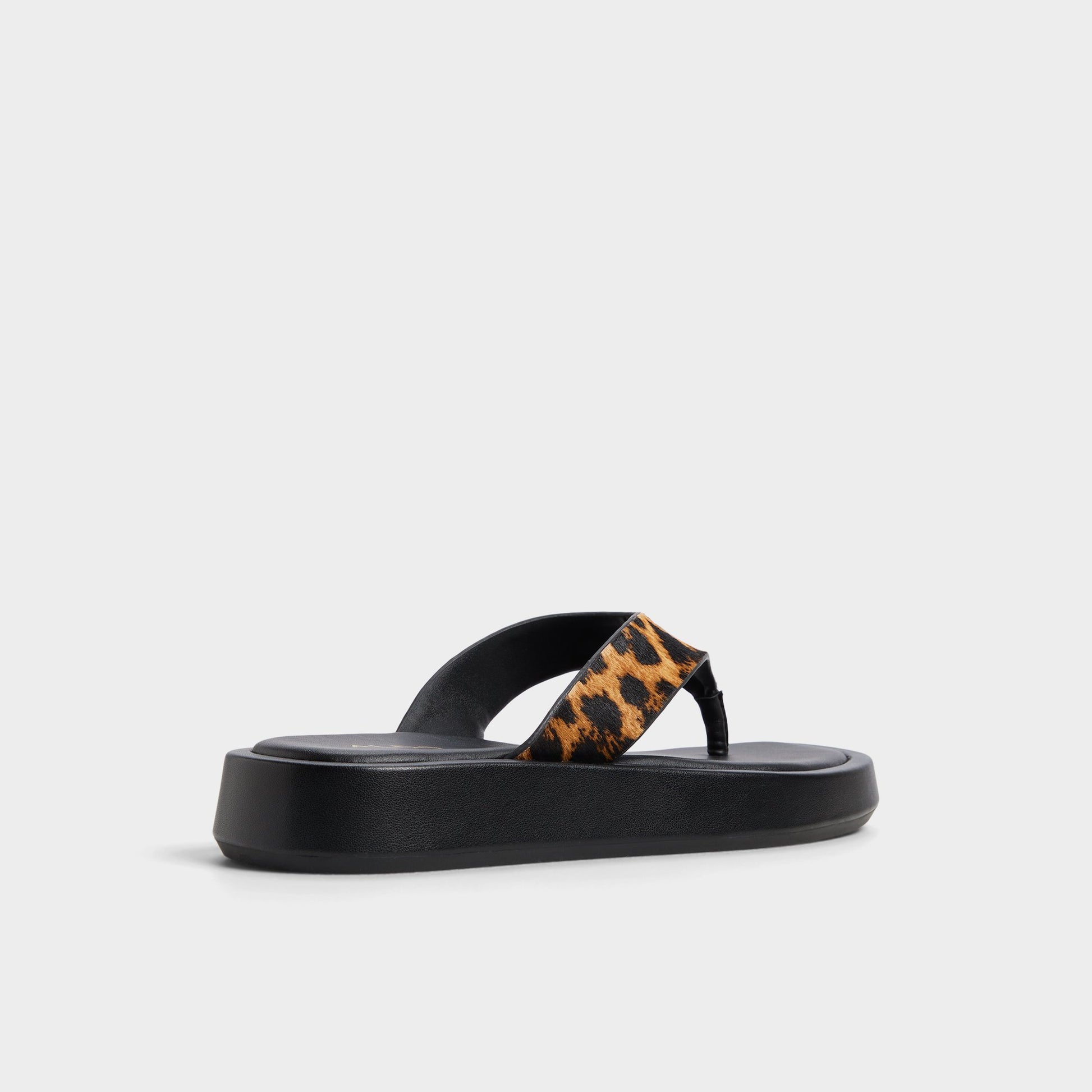 Three-quarter angle of Brown Multi Grettle Flip flop's back side