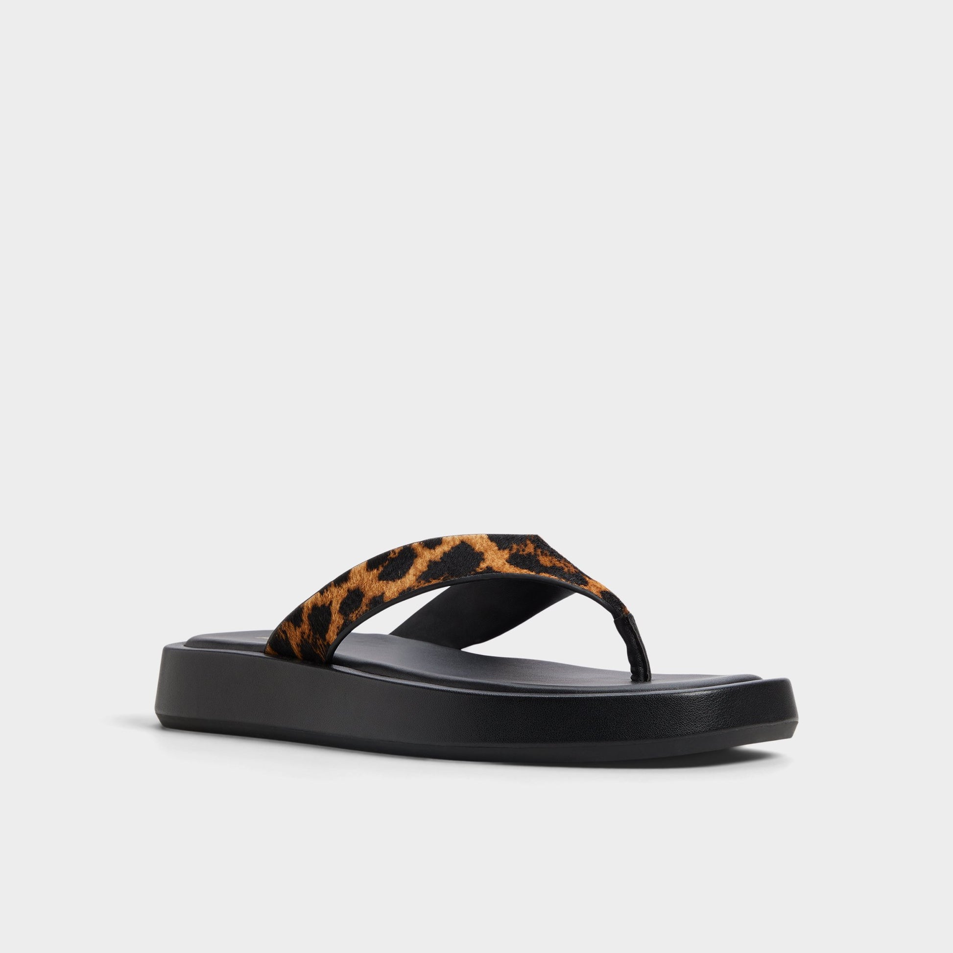 Three-quarter angle of Brown Multi Grettle Flip flop's front side
