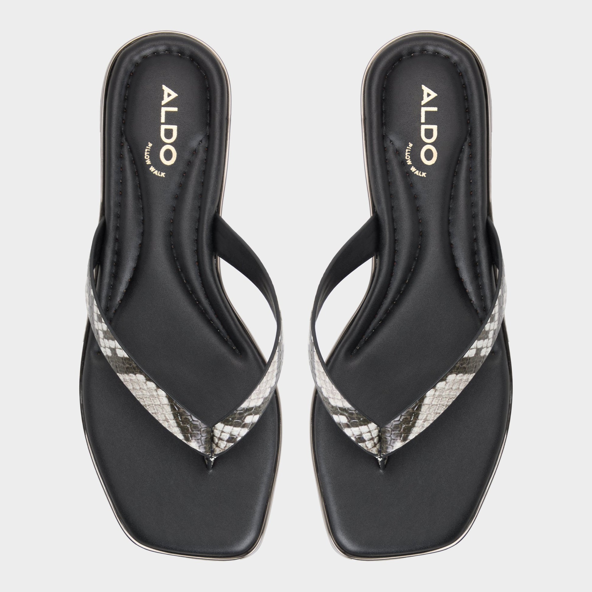 Top-down view of the White/Black Theao Flip flop