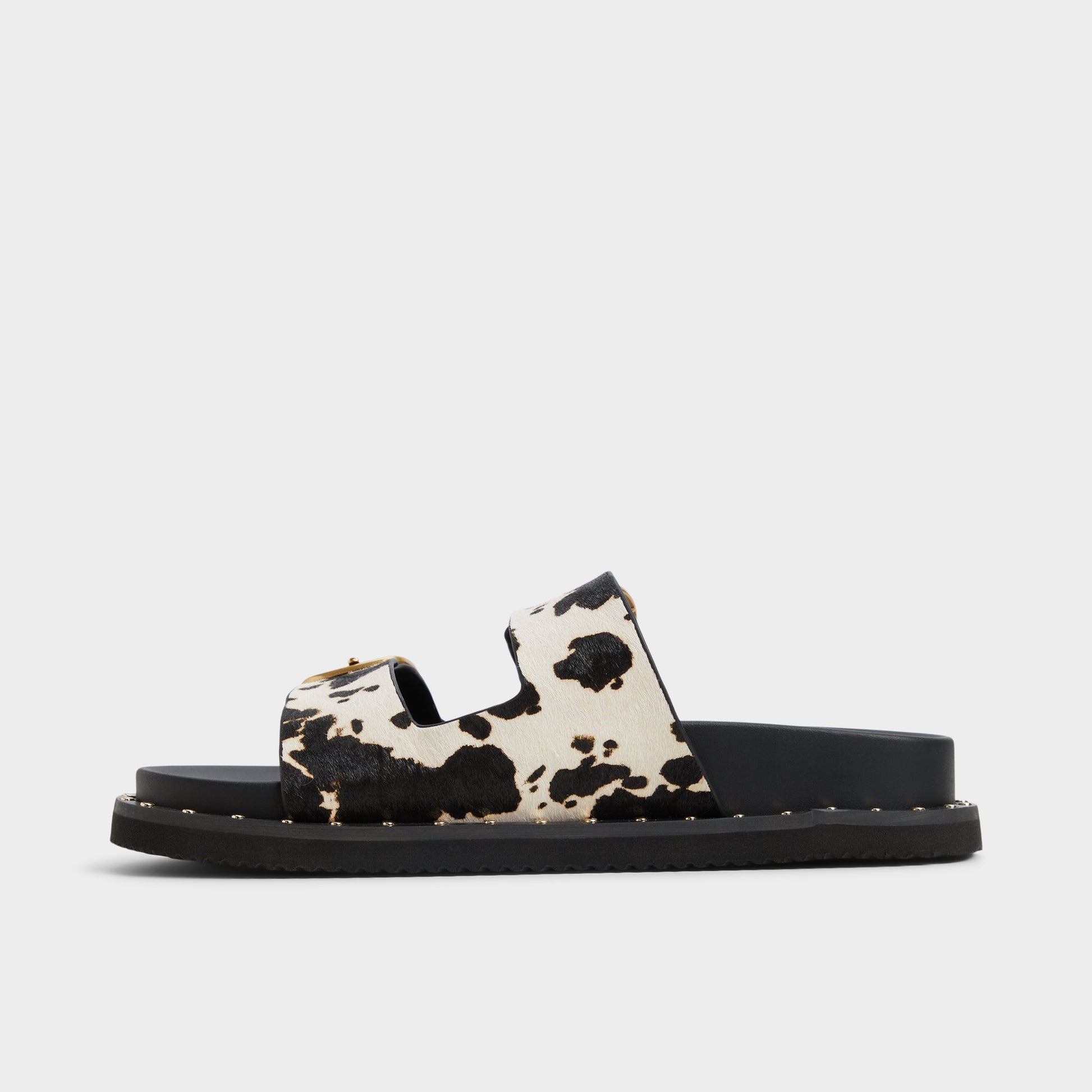 Side view of White/Black Kravis Slide sandal