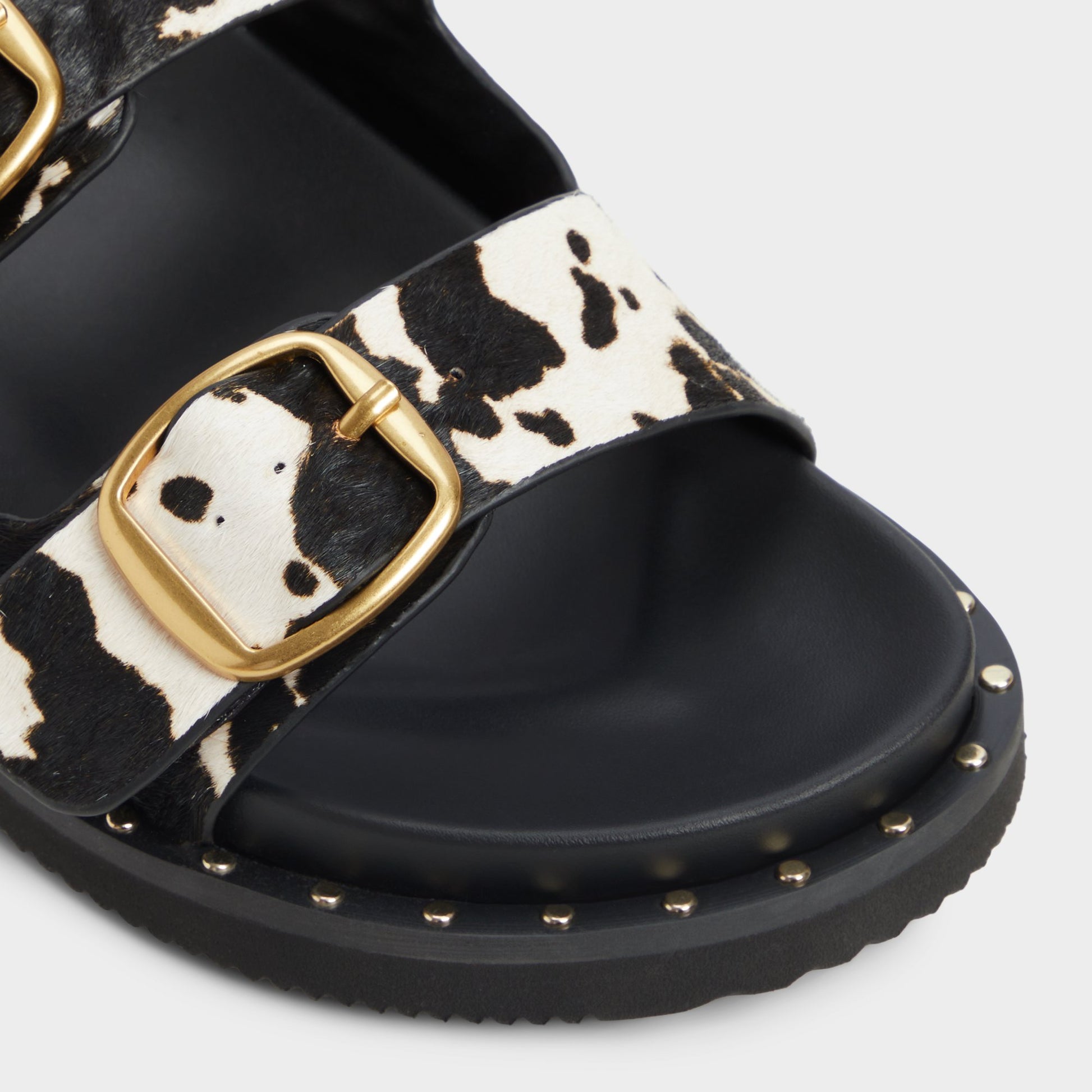 Close-up of the White/Black Kravis Slide sandal