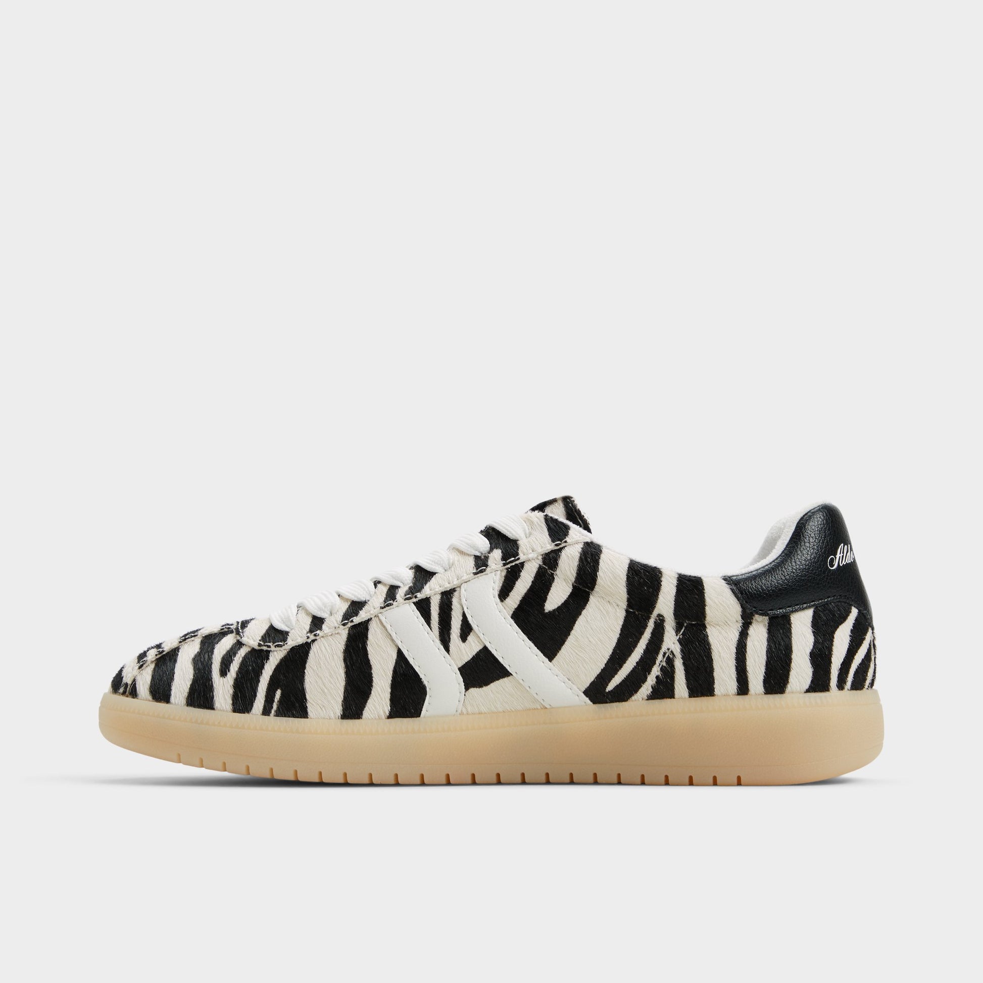 Side view of White/Black Chicsneaker Low top sneaker