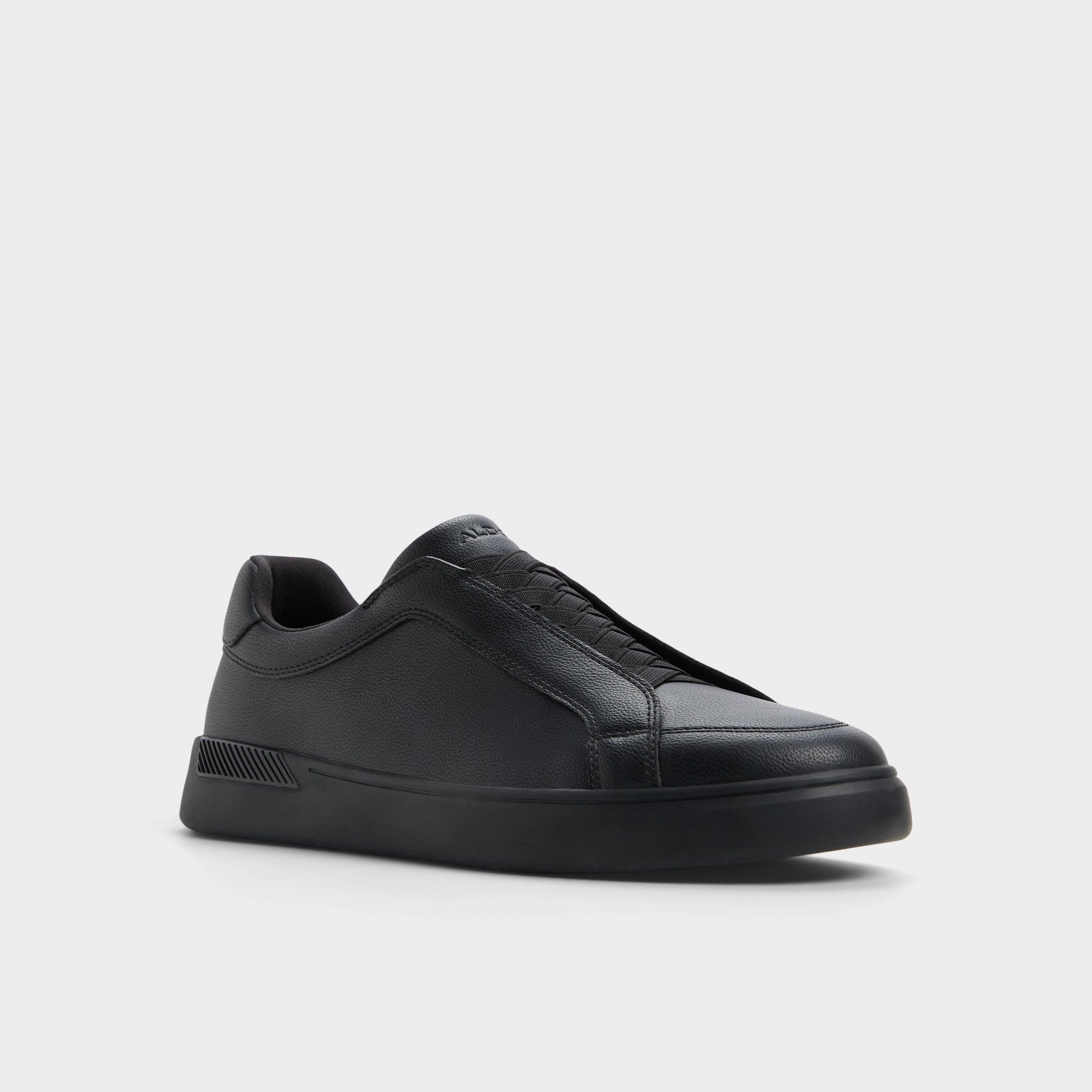 Three-quarter angle of Open Black Jona Slip-on sneaker's front side
