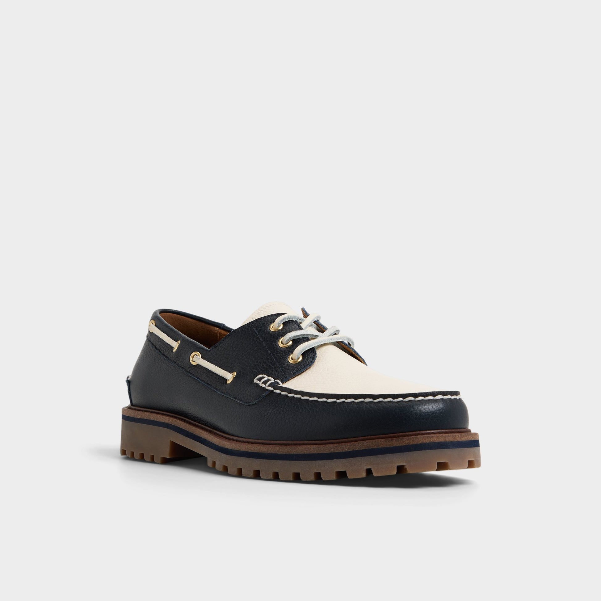 Three-quarter angle of Navy Cedric Boat shoe's front side