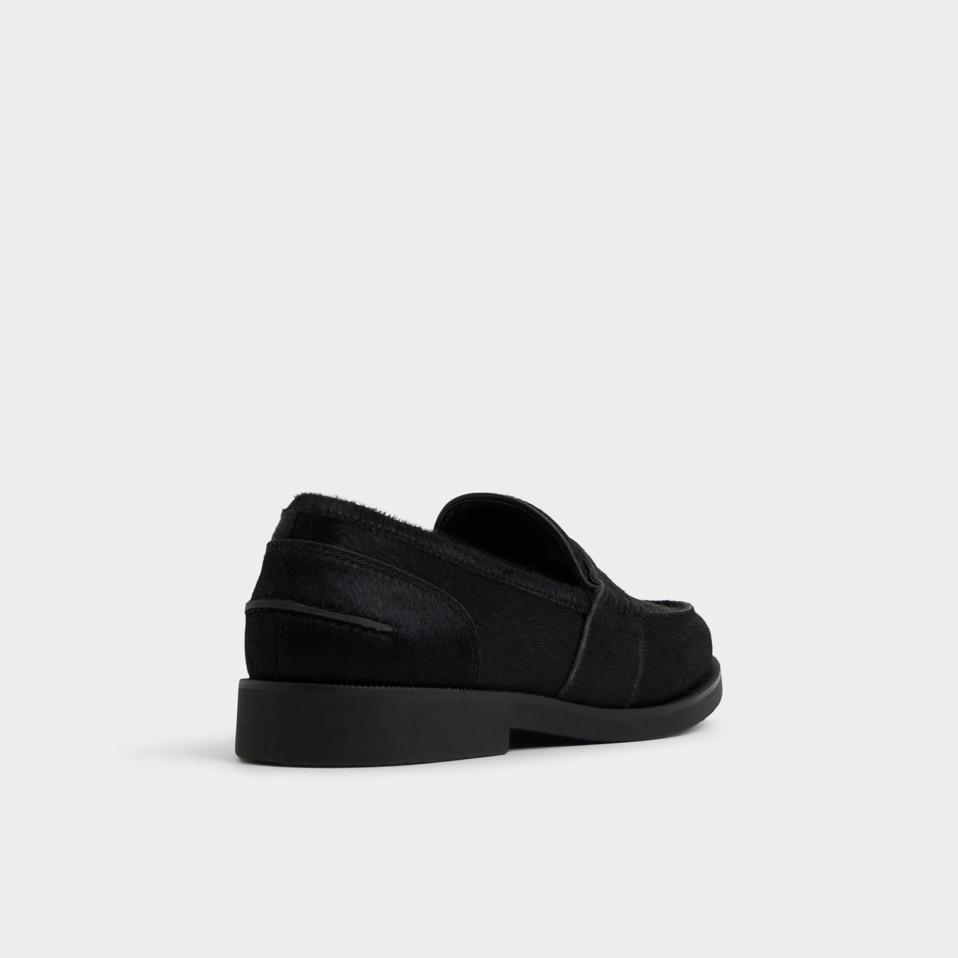 Three-quarter angle of Black Corbin Loafer's back side