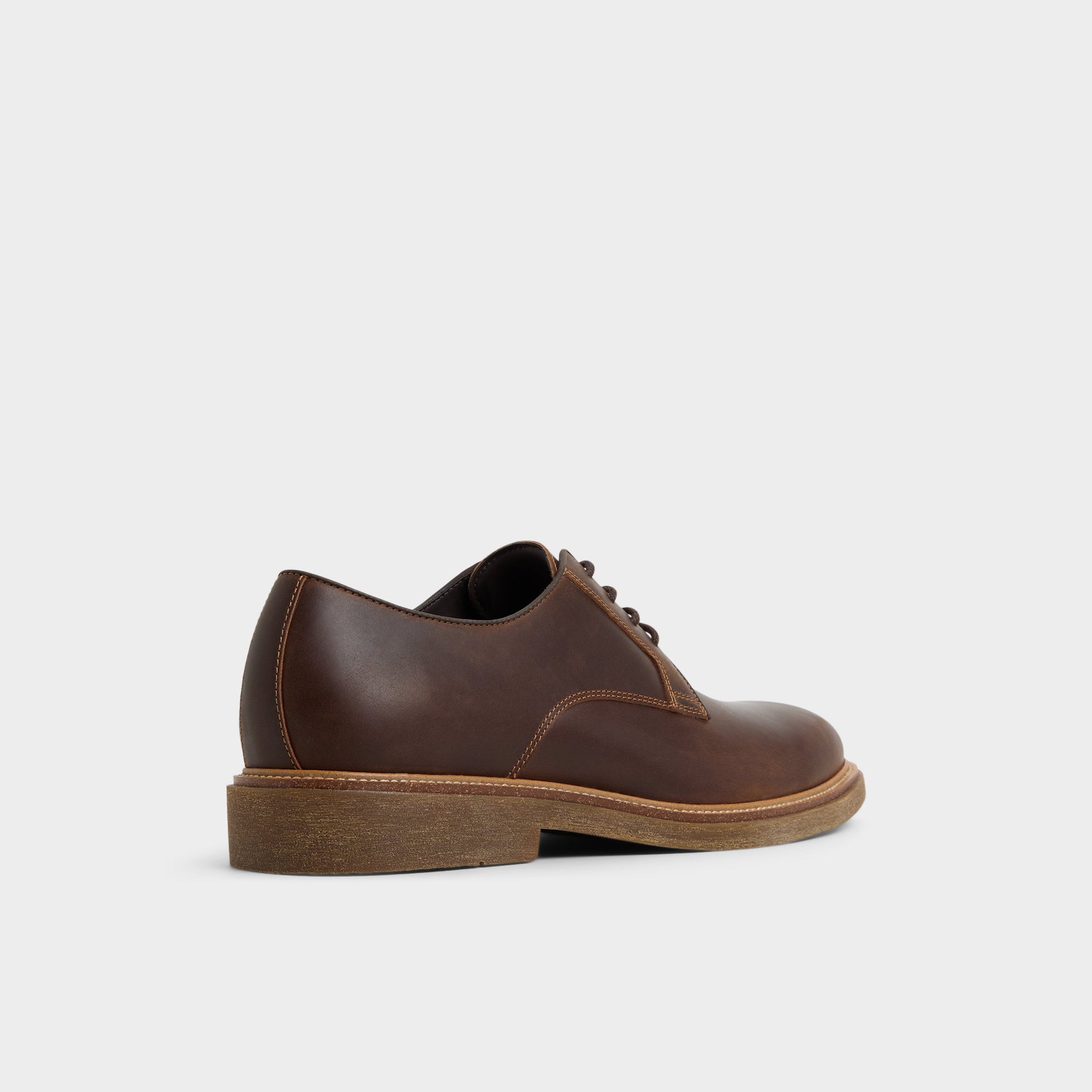 Three-quarter angle of Brown Overflow Raiden Derby shoe's back side