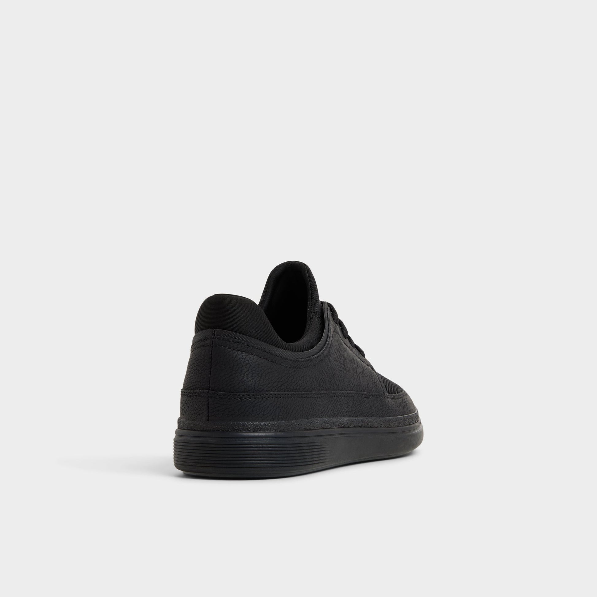 Three-quarter angle of Black Kurtis Low top sneaker's back side