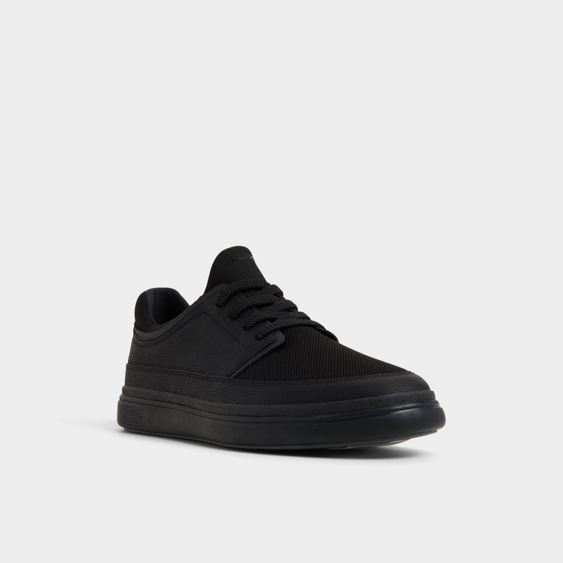 Three-quarter angle of Black Kurtis Low top sneaker's front side