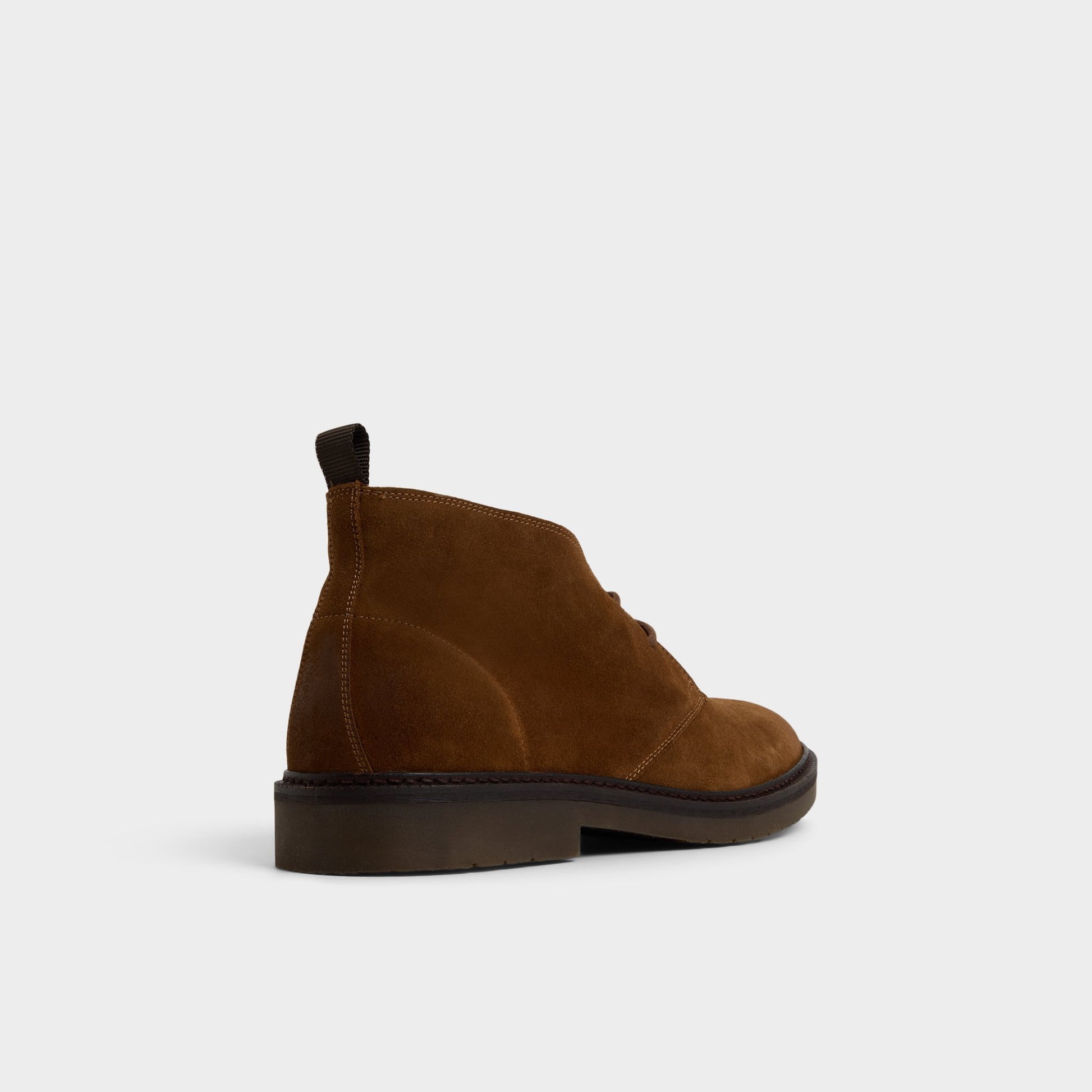Three-quarter angle of Dark Beige Zucca Chukka boot's back side