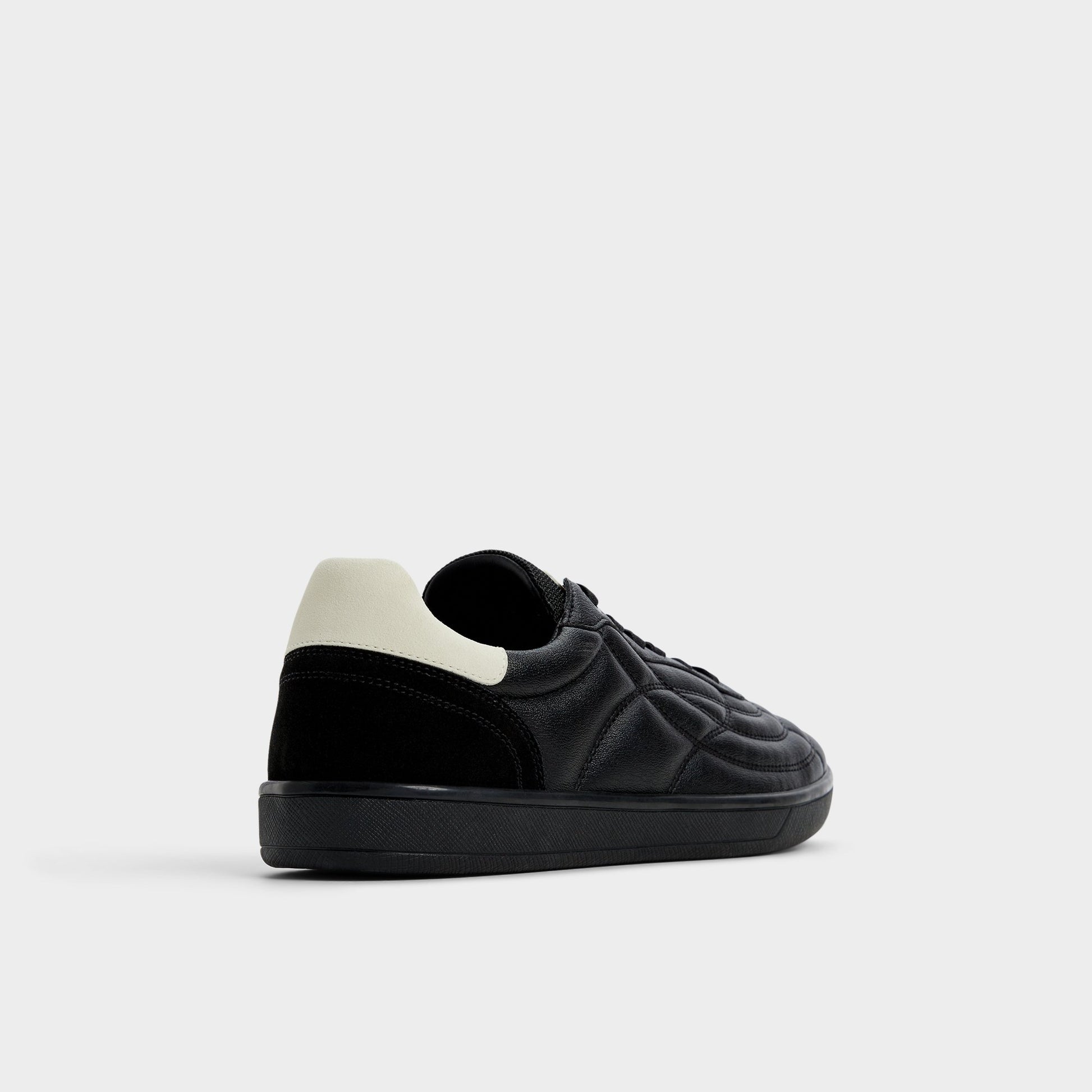 Three-quarter angle of Black Thepitch Low top sneaker's back side