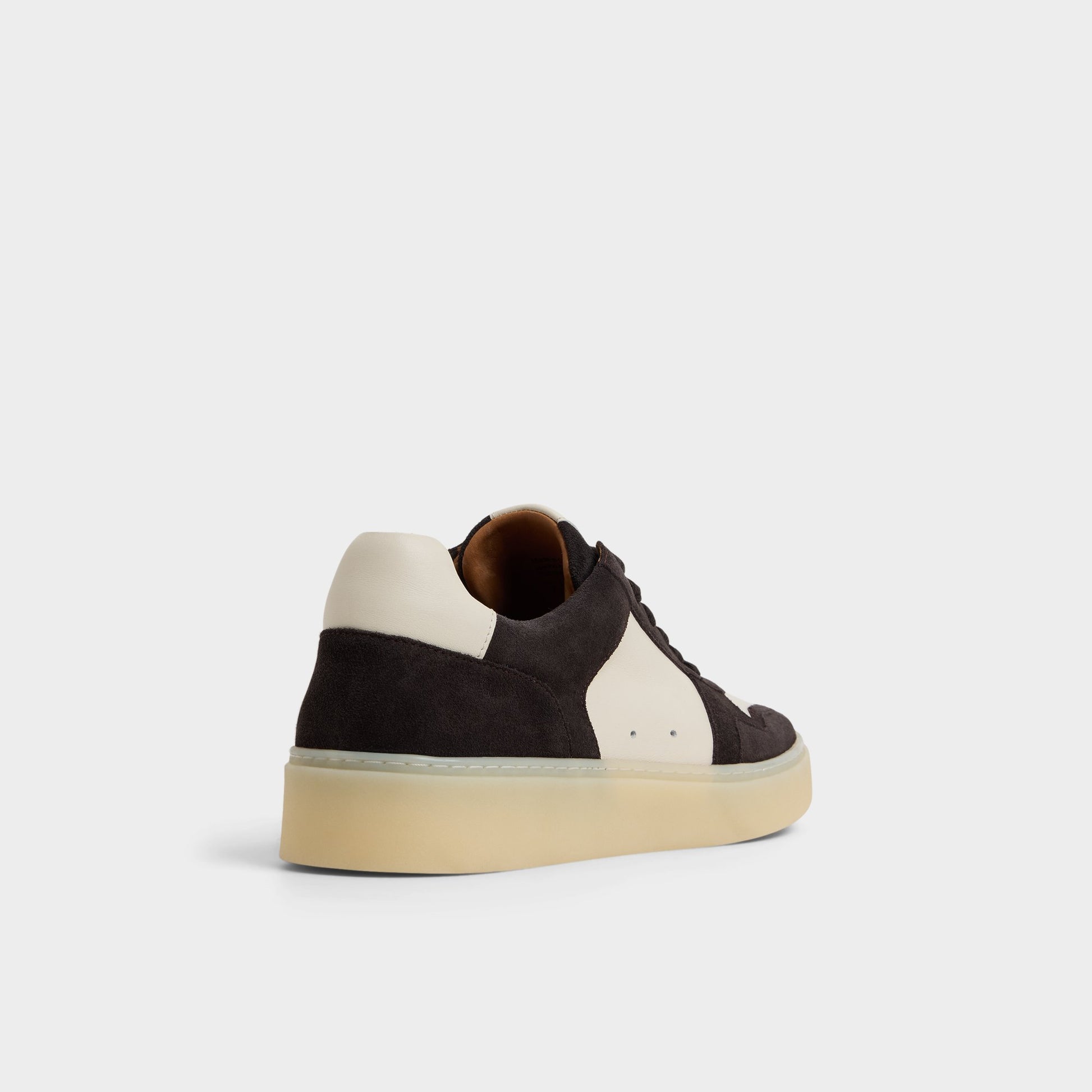 Three-quarter angle of Ivory Montie Low top sneaker's back side