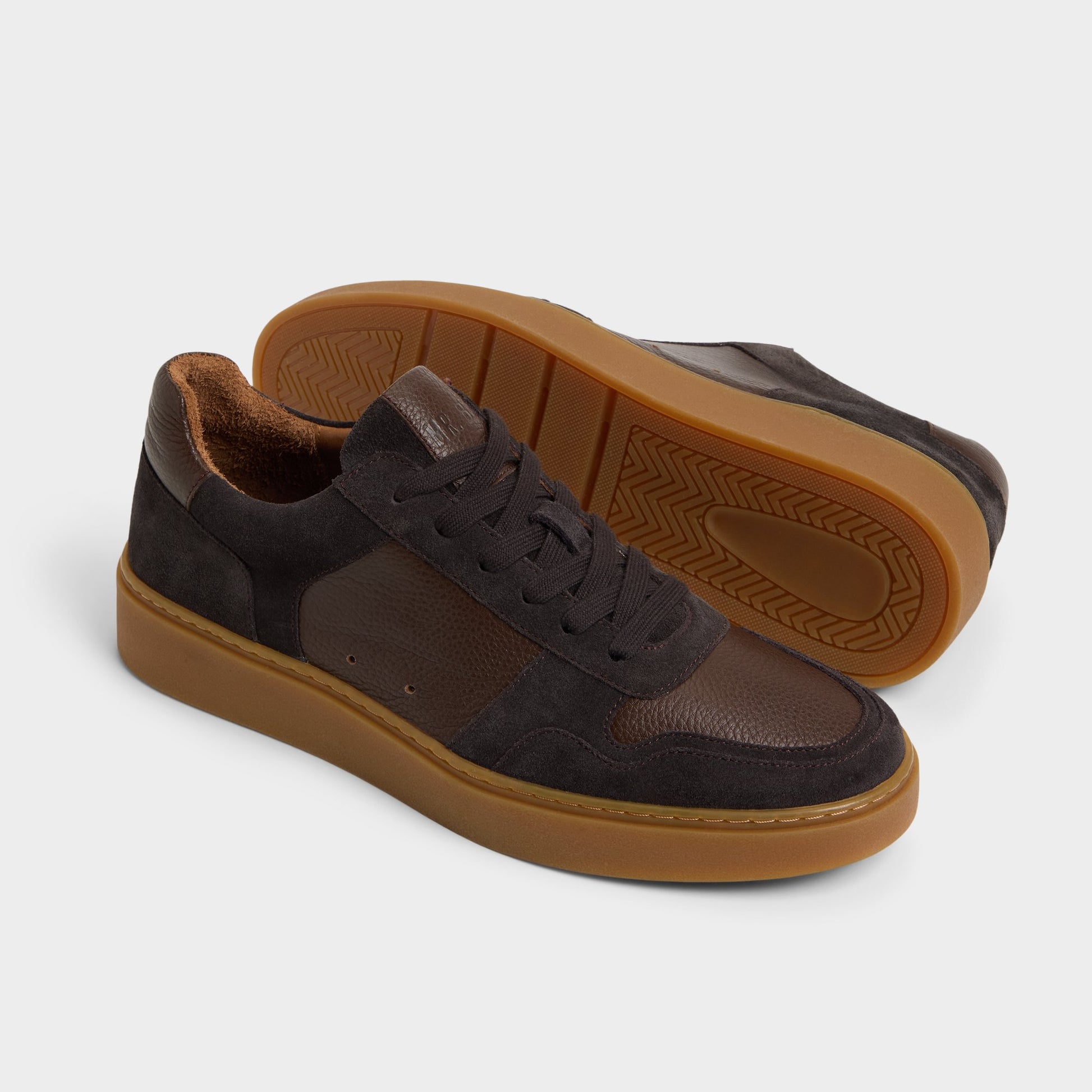 Highlighted view of a pair of Dark Brown Montie Low top sneakers