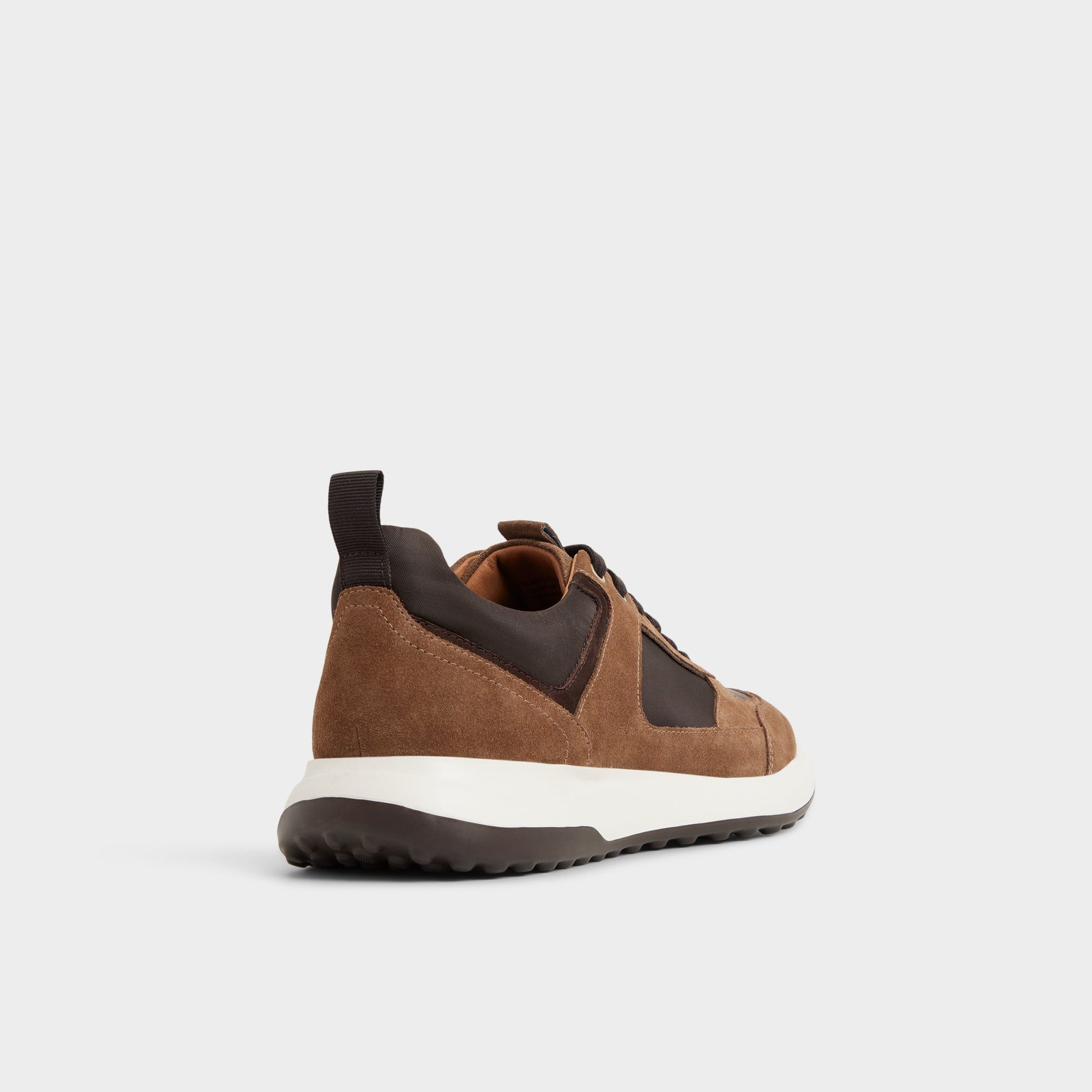 Three-quarter angle of Open Brown Jeromy Jogger sneaker's back side