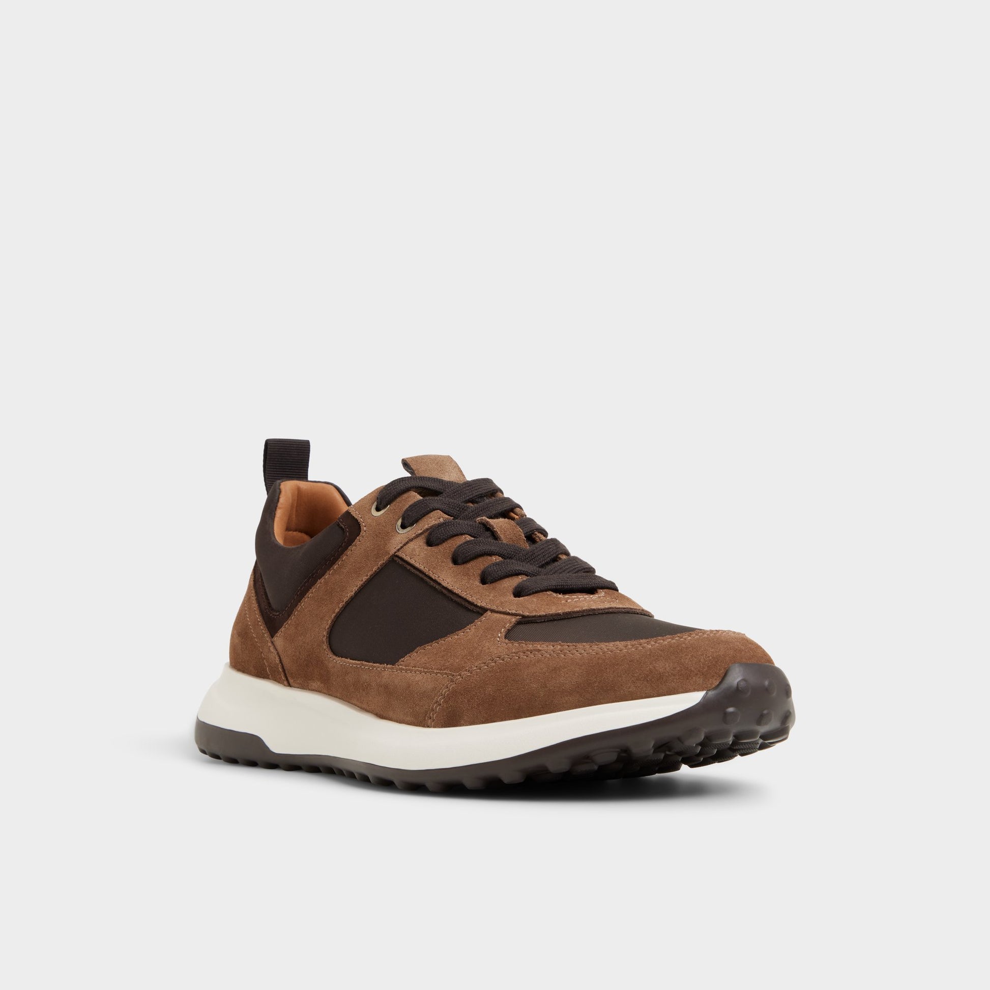 Three-quarter angle of Open Brown Jeromy Jogger sneaker's front side