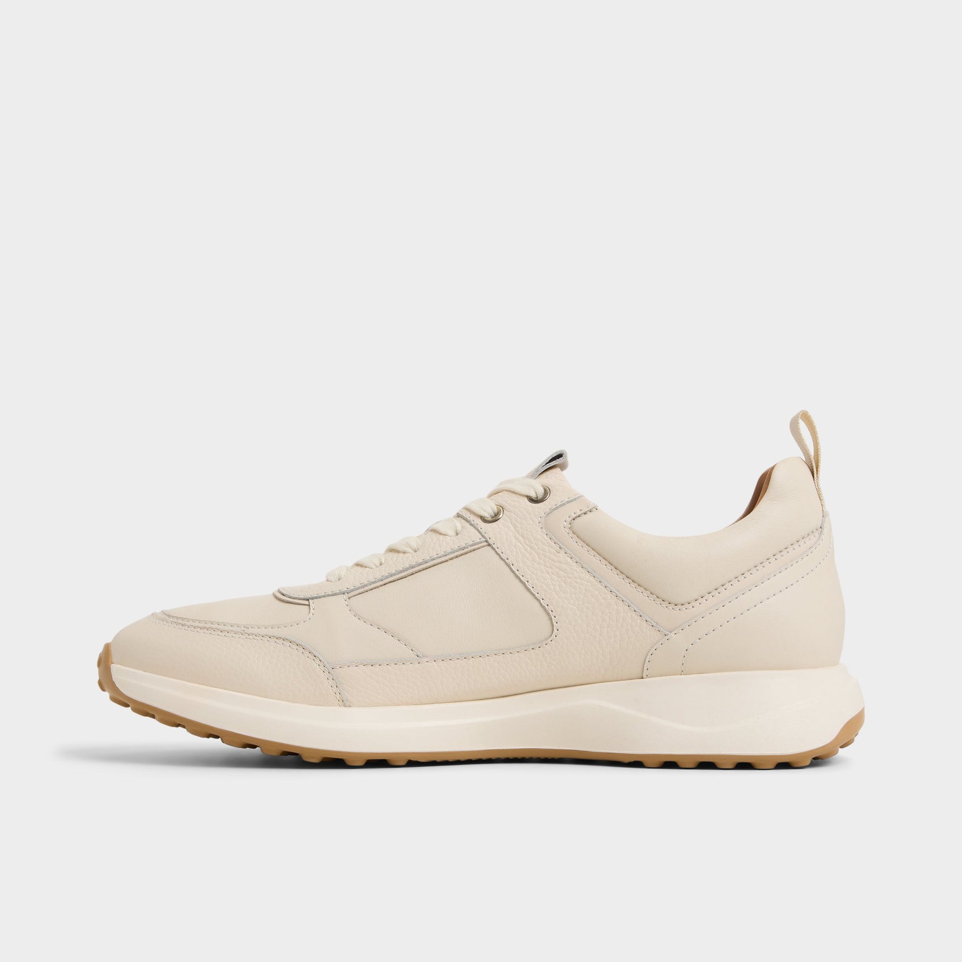 Side view of Ivory Jeromy Jogger sneaker