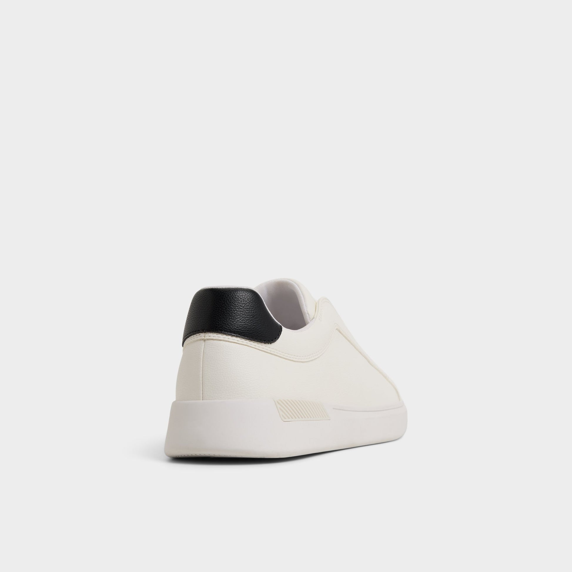 Three-quarter angle of White Jona Slip-on sneaker's back side