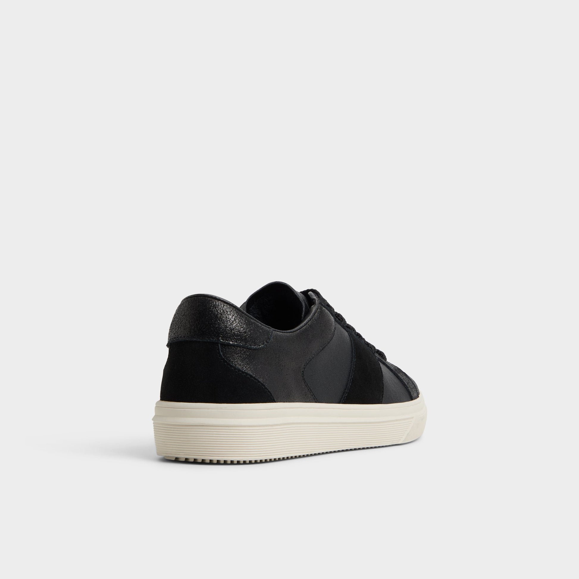Three-quarter angle of Black Braxton Low top sneaker's back side