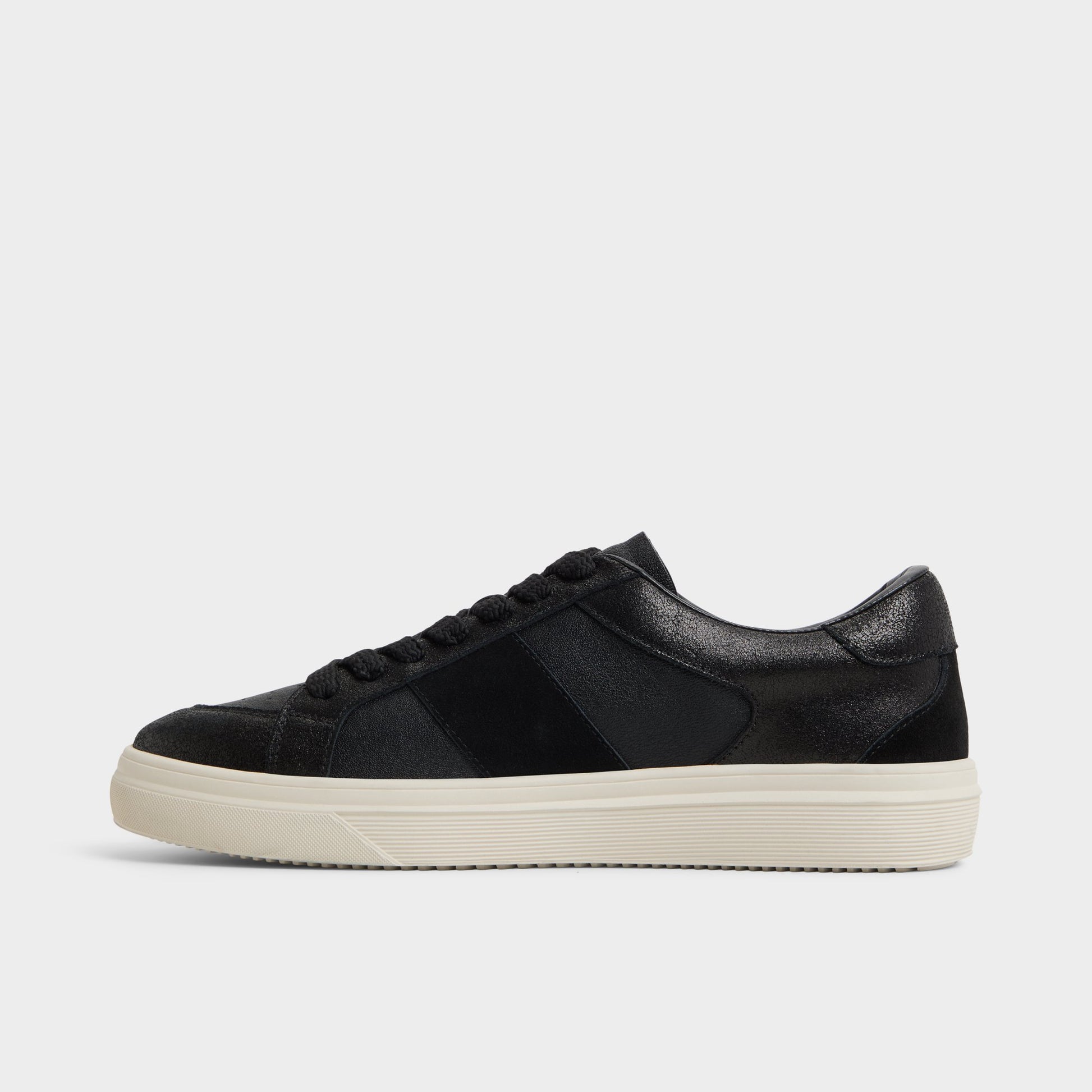 Side view of Black Braxton Low top sneaker