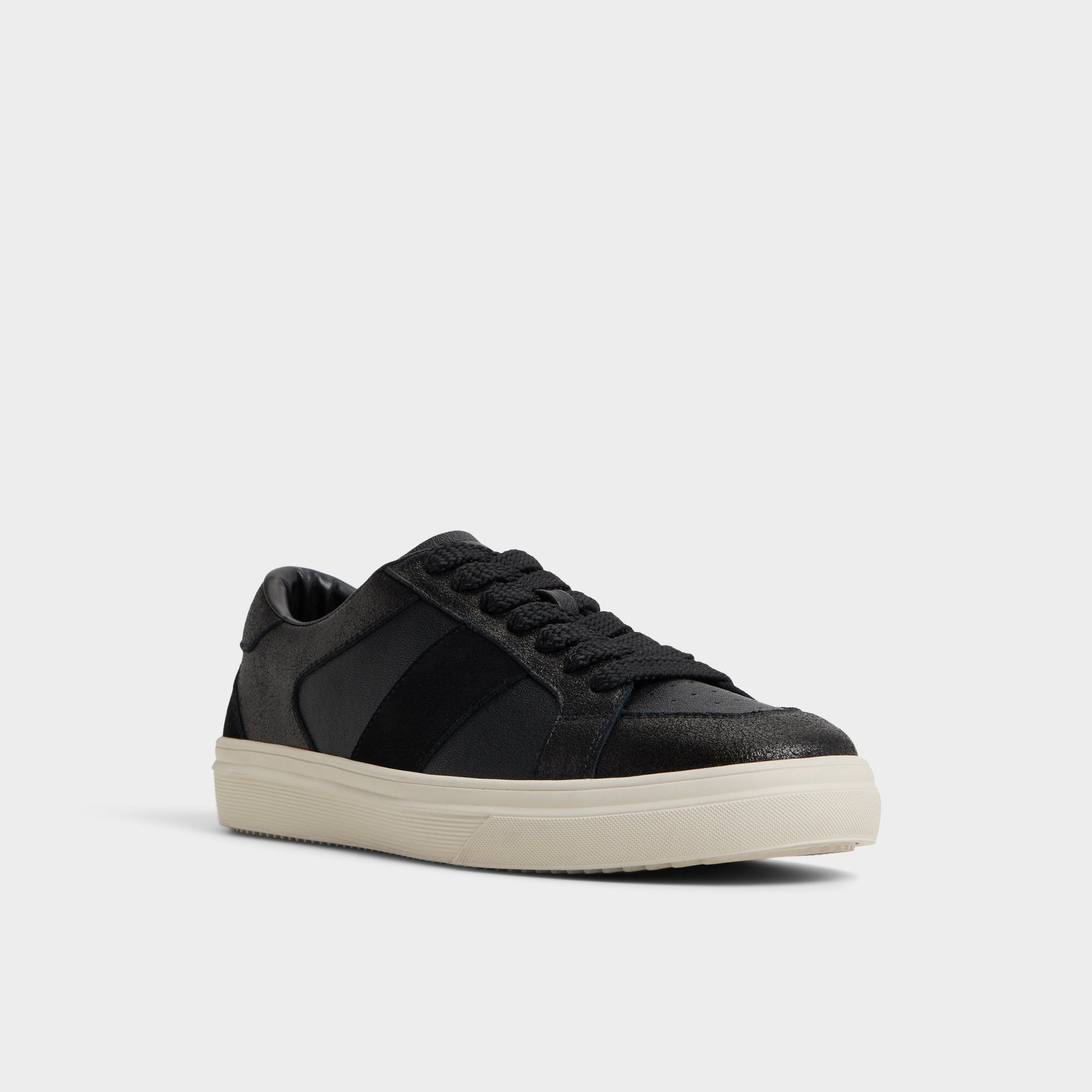 Three-quarter angle of Black Braxton Low top sneaker's front side