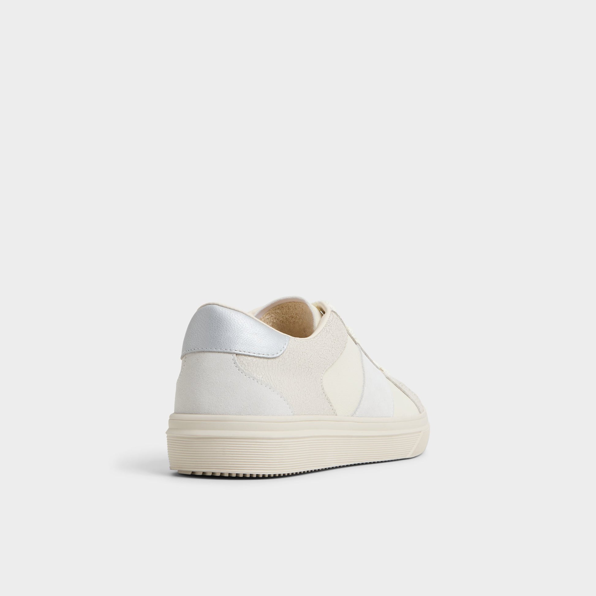 Three-quarter angle of White Braxton Low top sneaker's back side