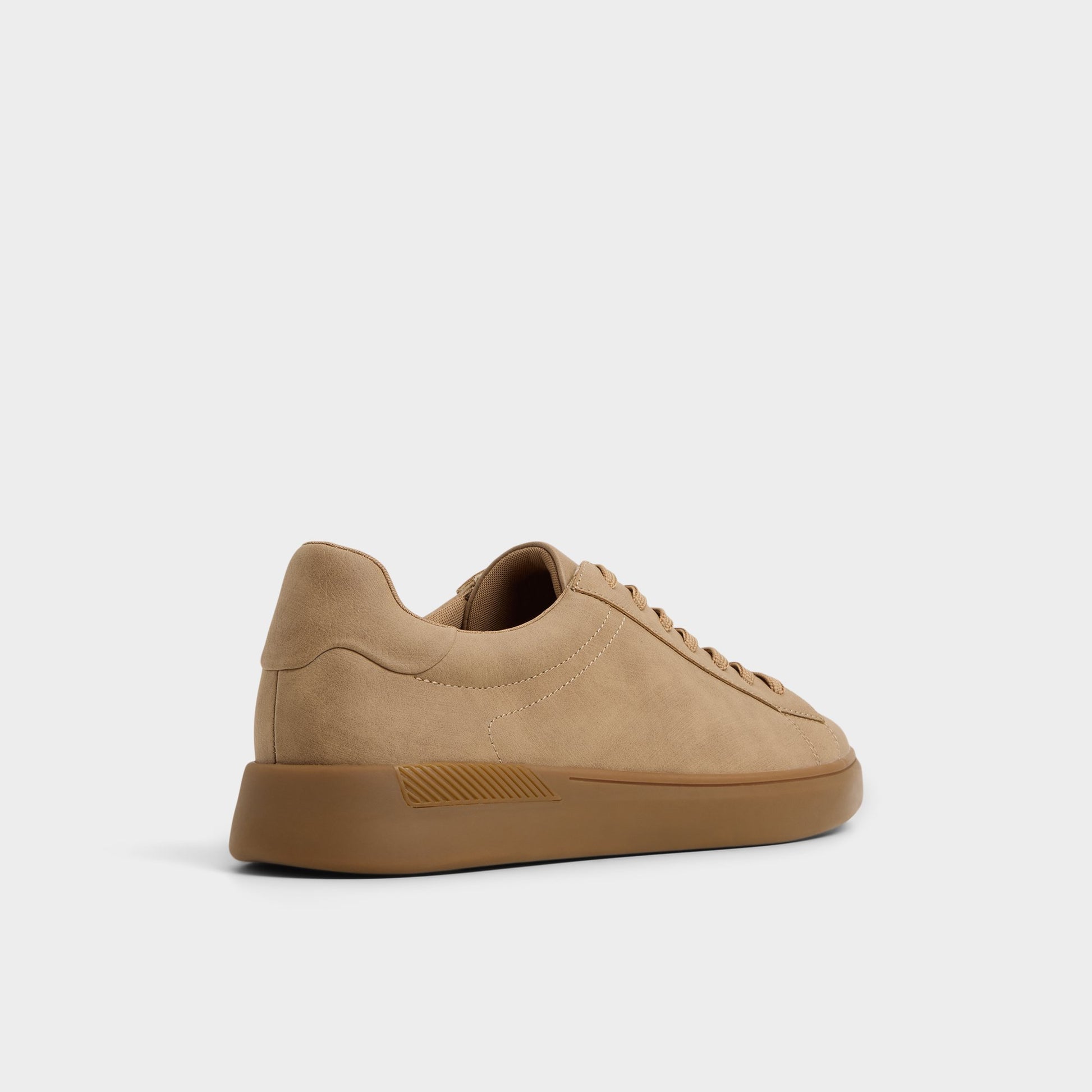 Three-quarter angle of Light Beige Coolspec Low top sneaker's back side