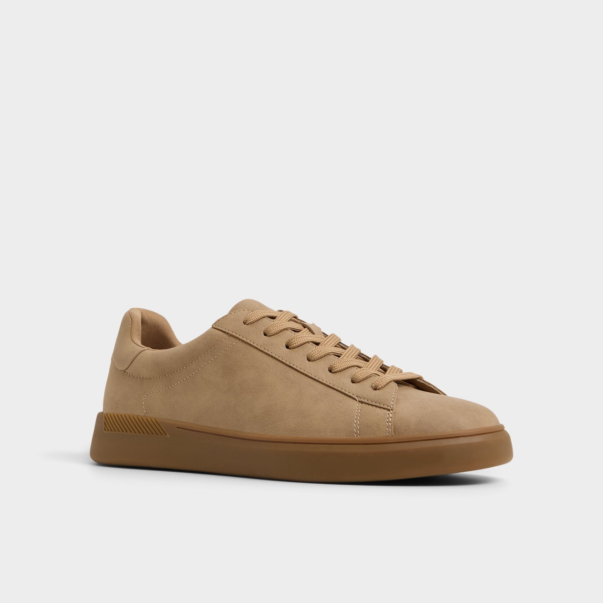 Three-quarter angle of Light Beige Coolspec Low top sneaker's front side