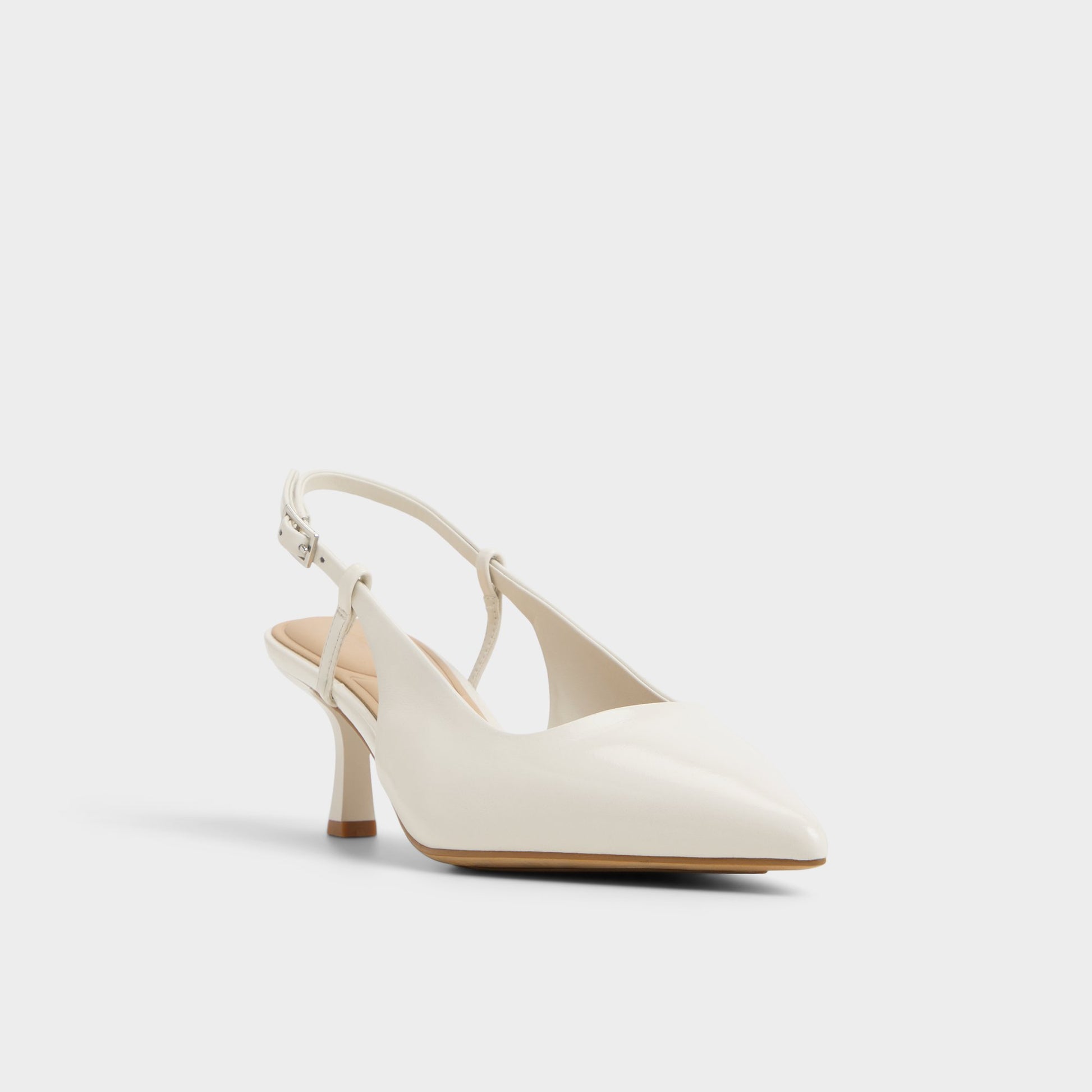 Three-quarter angle of White/Bone Adan Slingback heel's front side