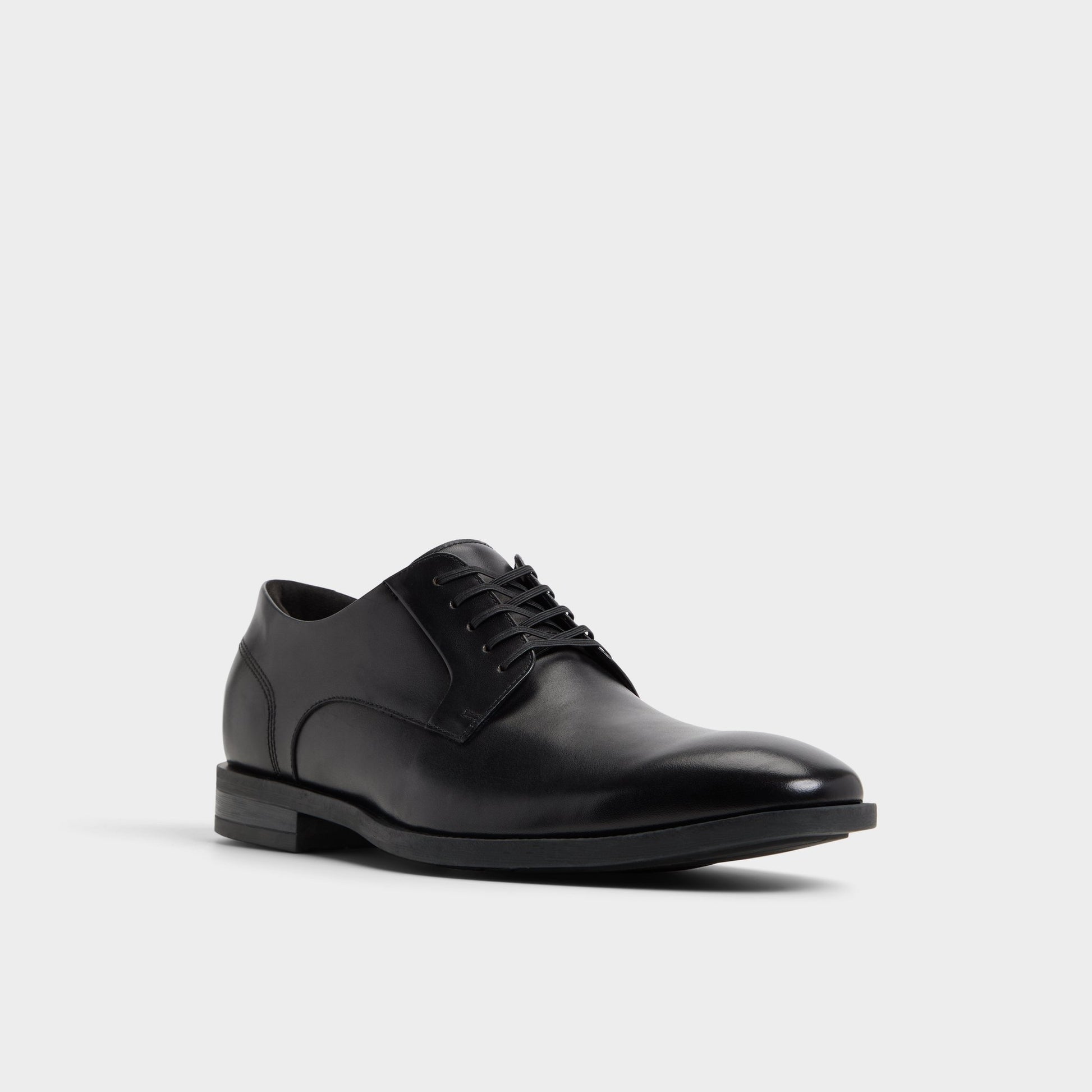 Three-quarter angle of Black Teodoro Derby shoe's front side