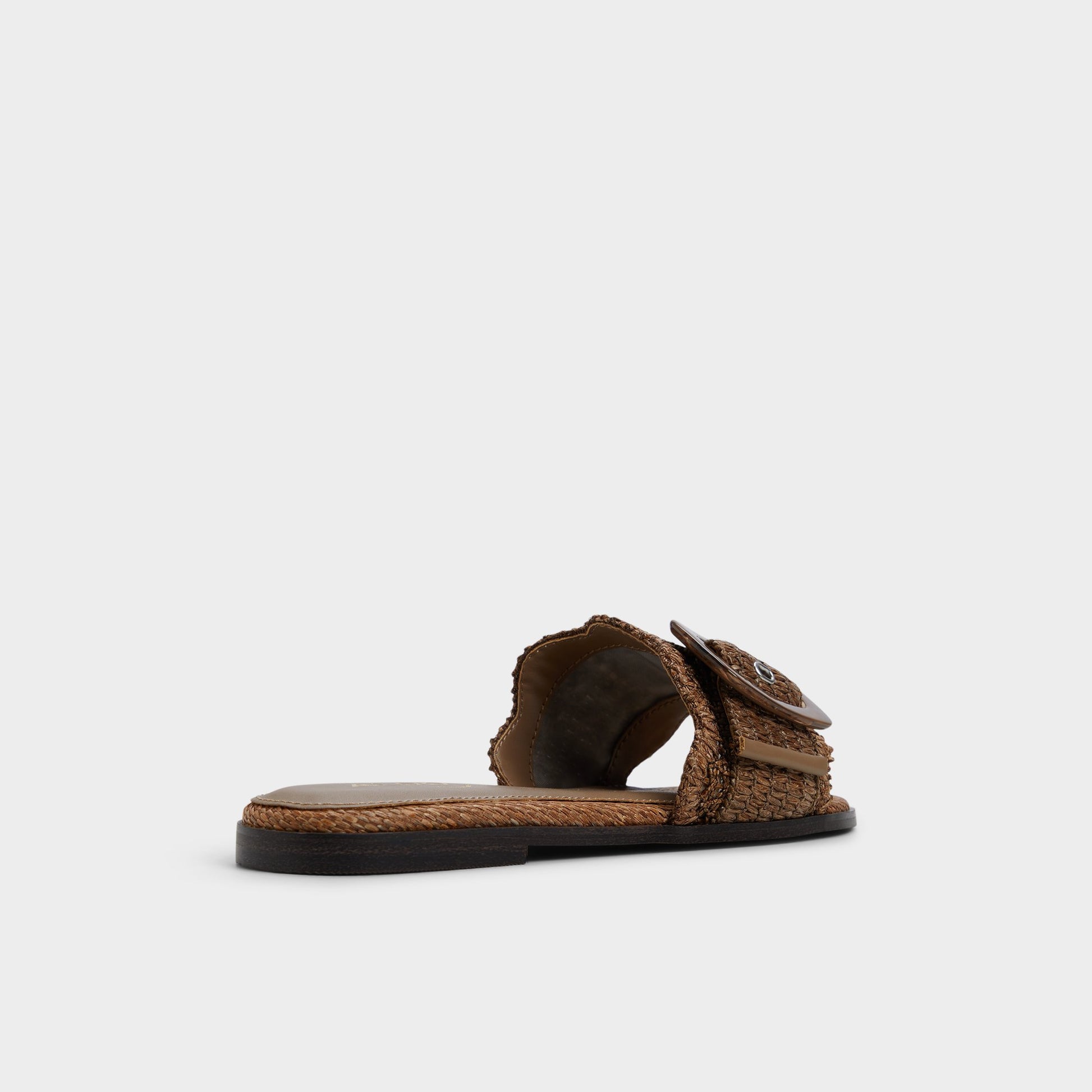 Three-quarter angle of Light brown Wavysally Slide sandal's back side
