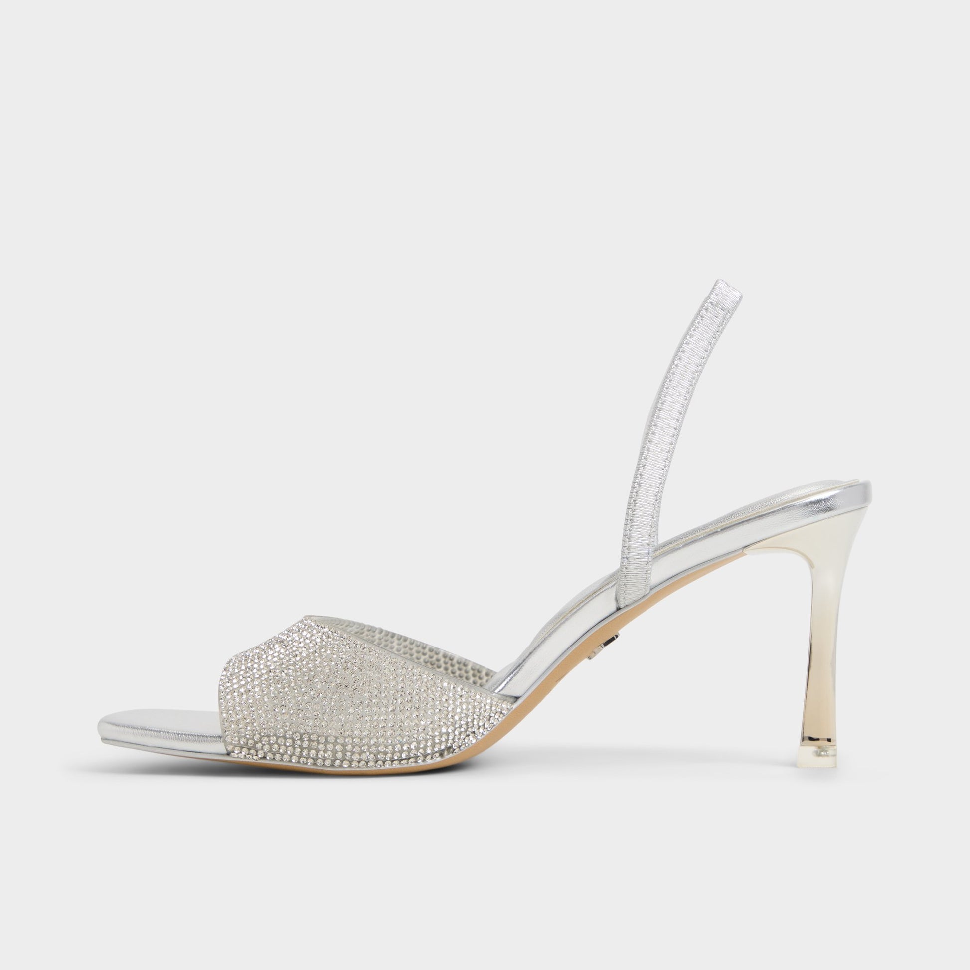 Side view of Silver Andyana Slingback heeled sandal