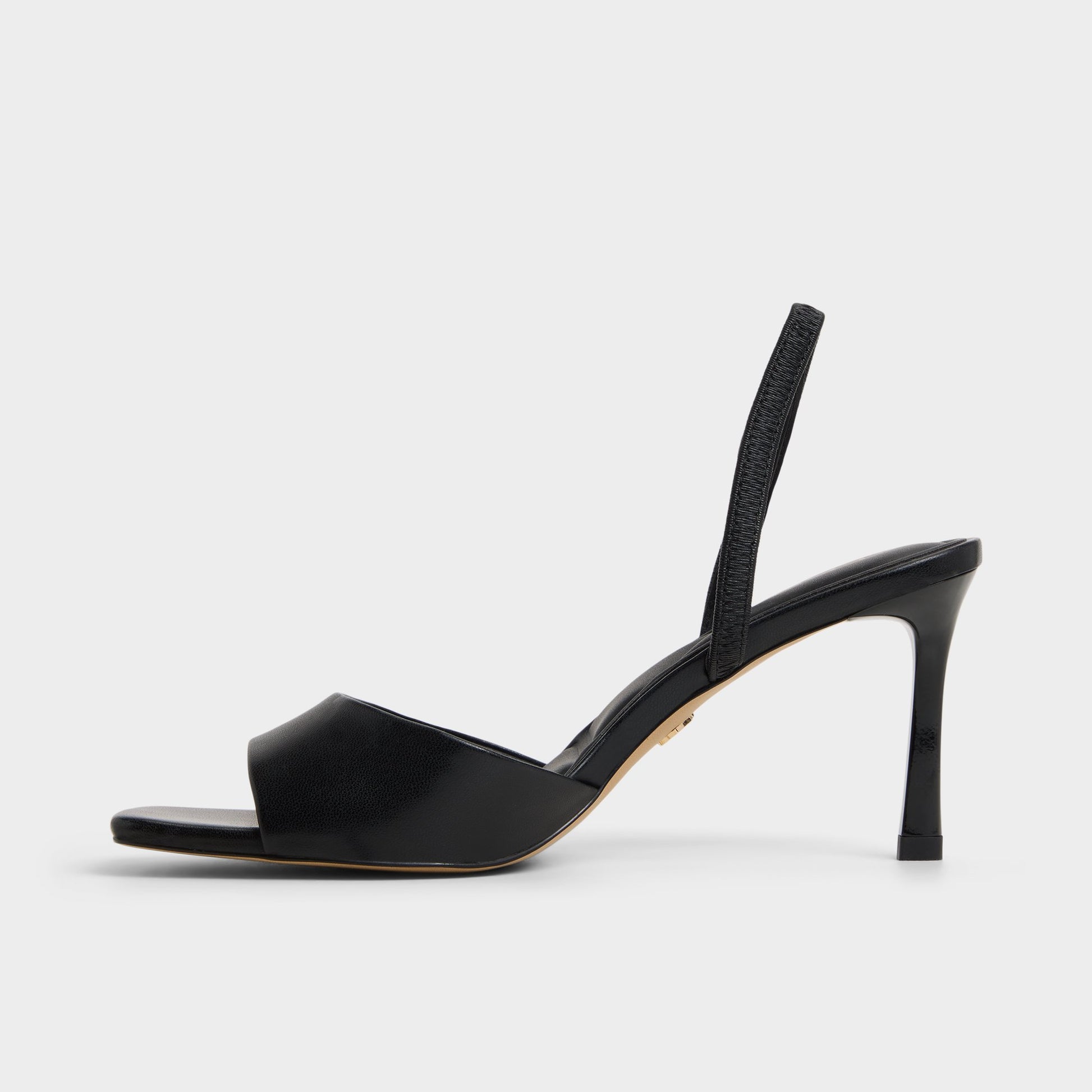 Side view of Black Andya Slingback heeled sandal