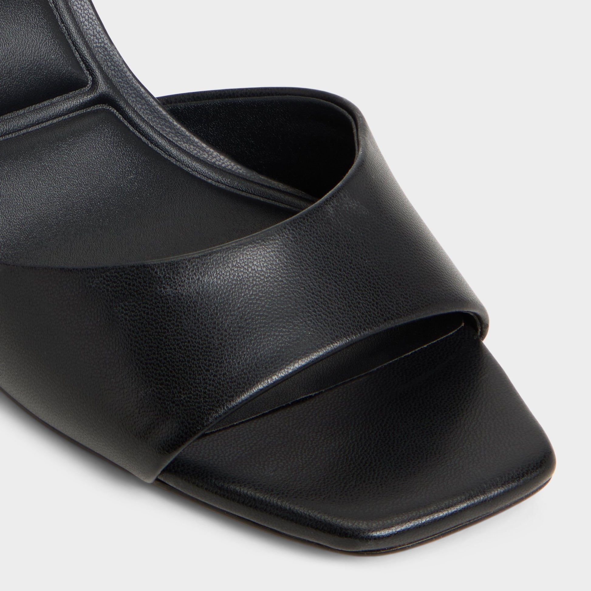 Close-up of the Black Andya Slingback heeled sandal