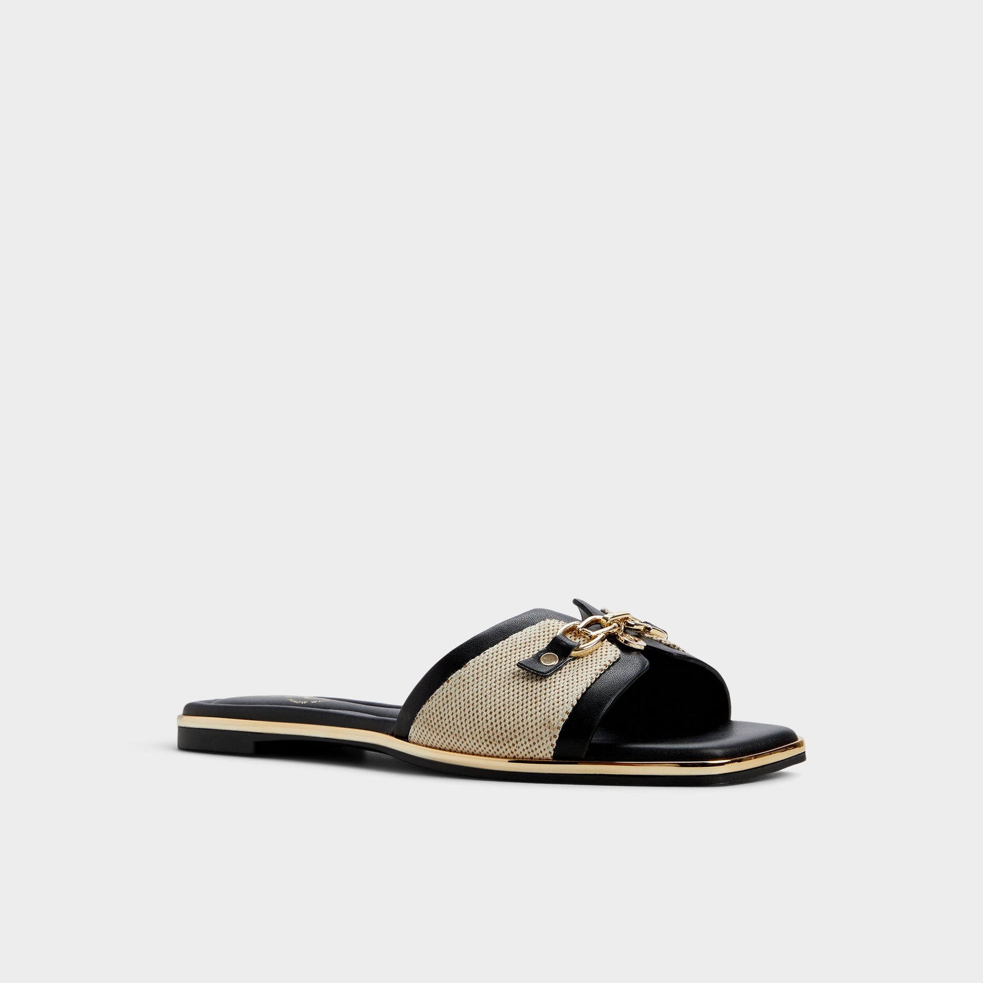 Three-quarter angle of Natural Alamassi Slide sandal's front side