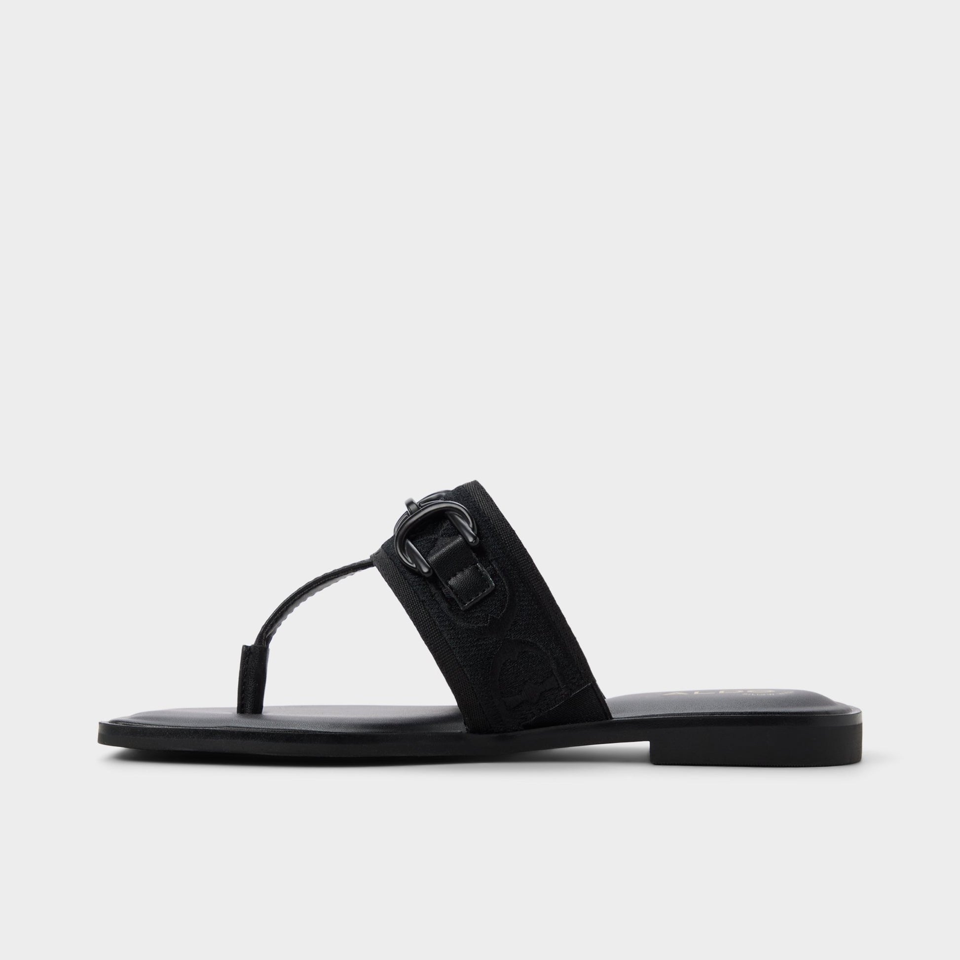 Side view of Black Coralynna T-strap sandal