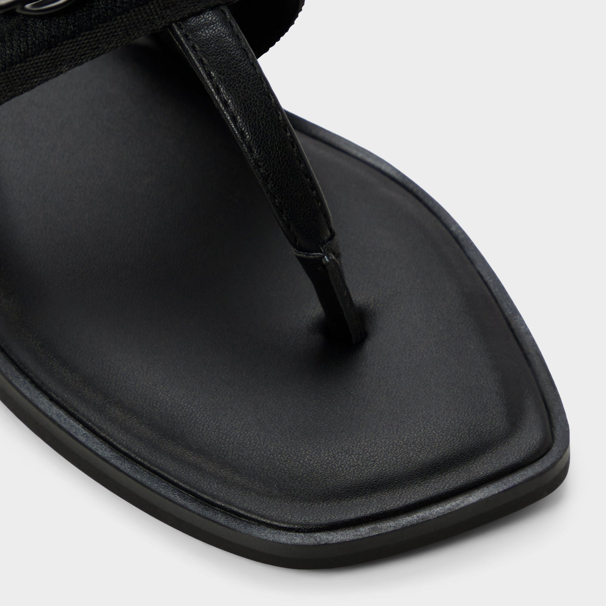Close-up of the Black Coralynna T-strap sandal