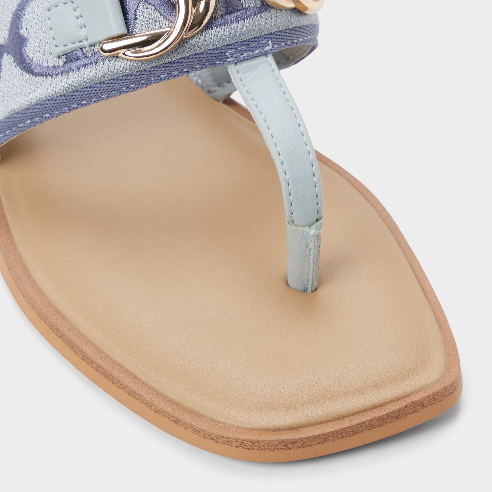 Close-up of the Other Blue Coralynna T-strap sandal
