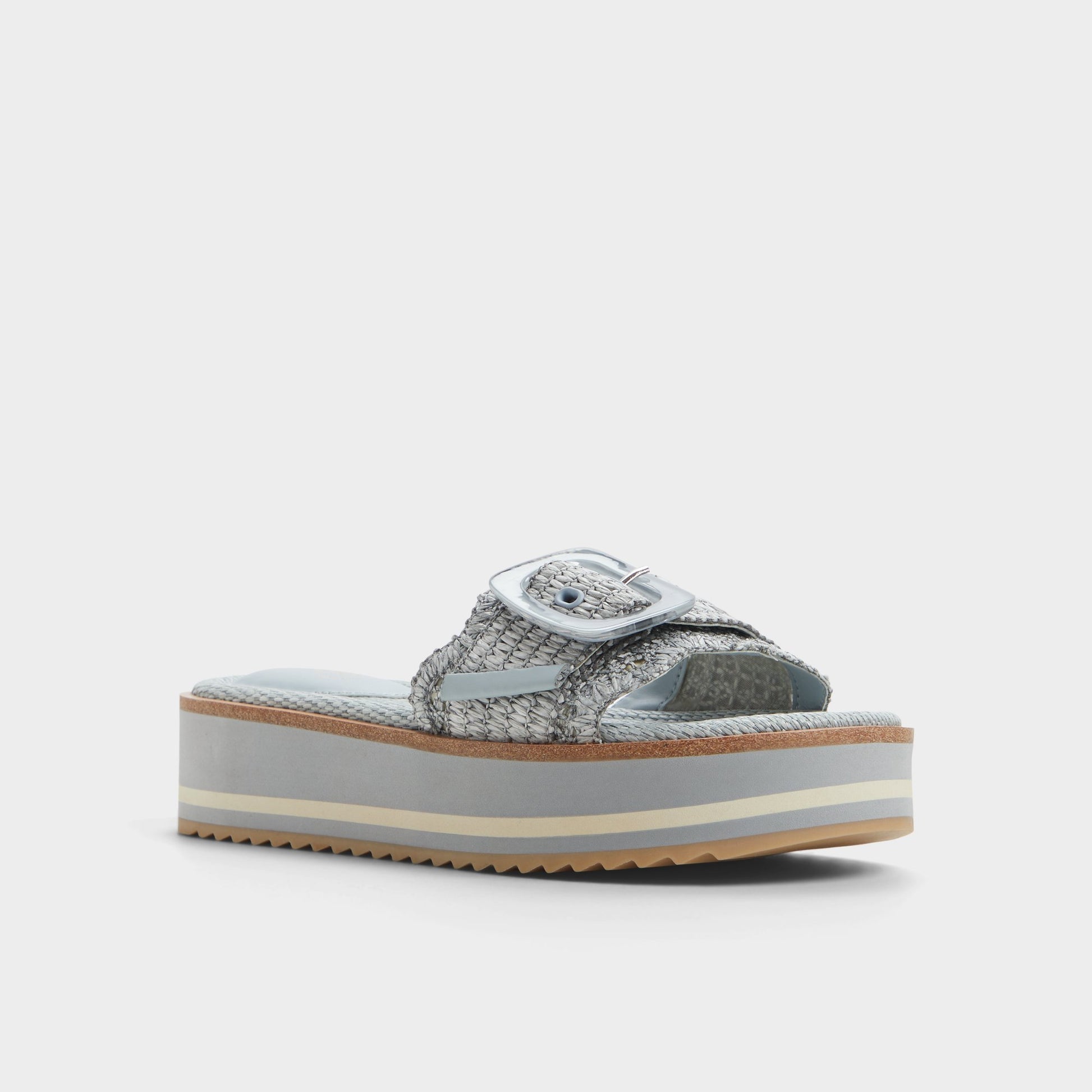 Three-quarter angle of Other Blue Wavynelly Slide sandal's front side