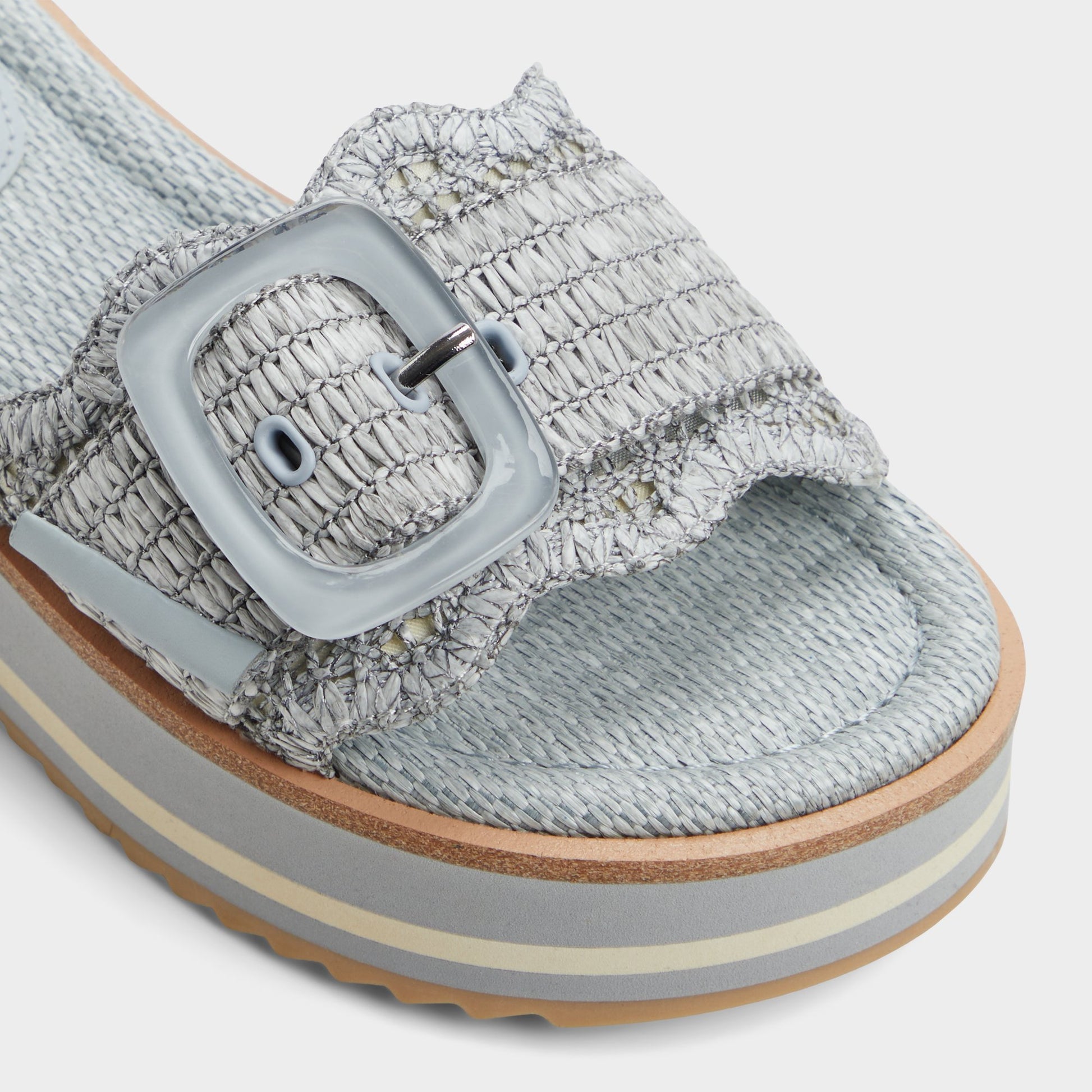 Close-up of the Other Blue Wavynelly Slide sandal