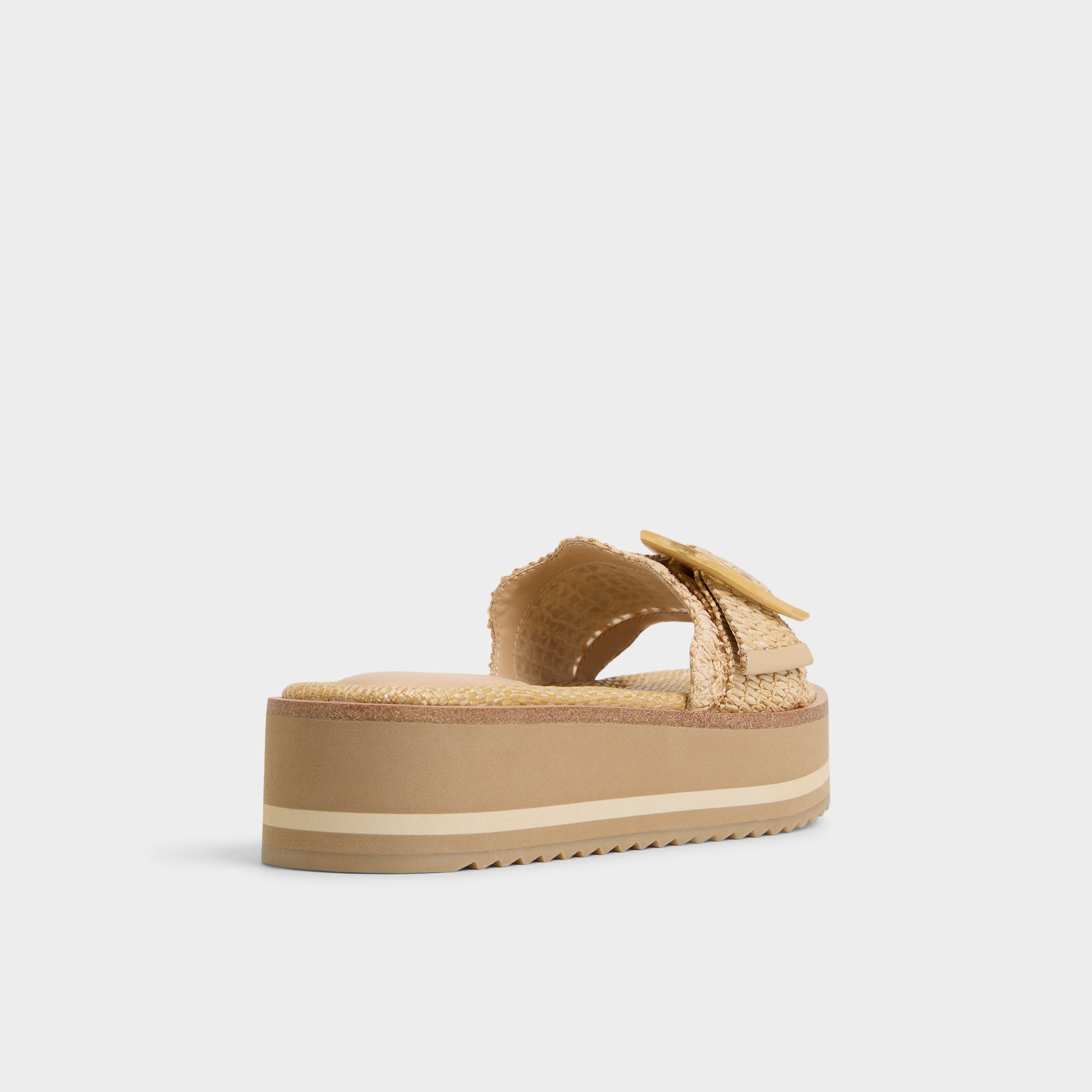 Three-quarter angle of Light Beige Wavynelly Slide sandal's back side