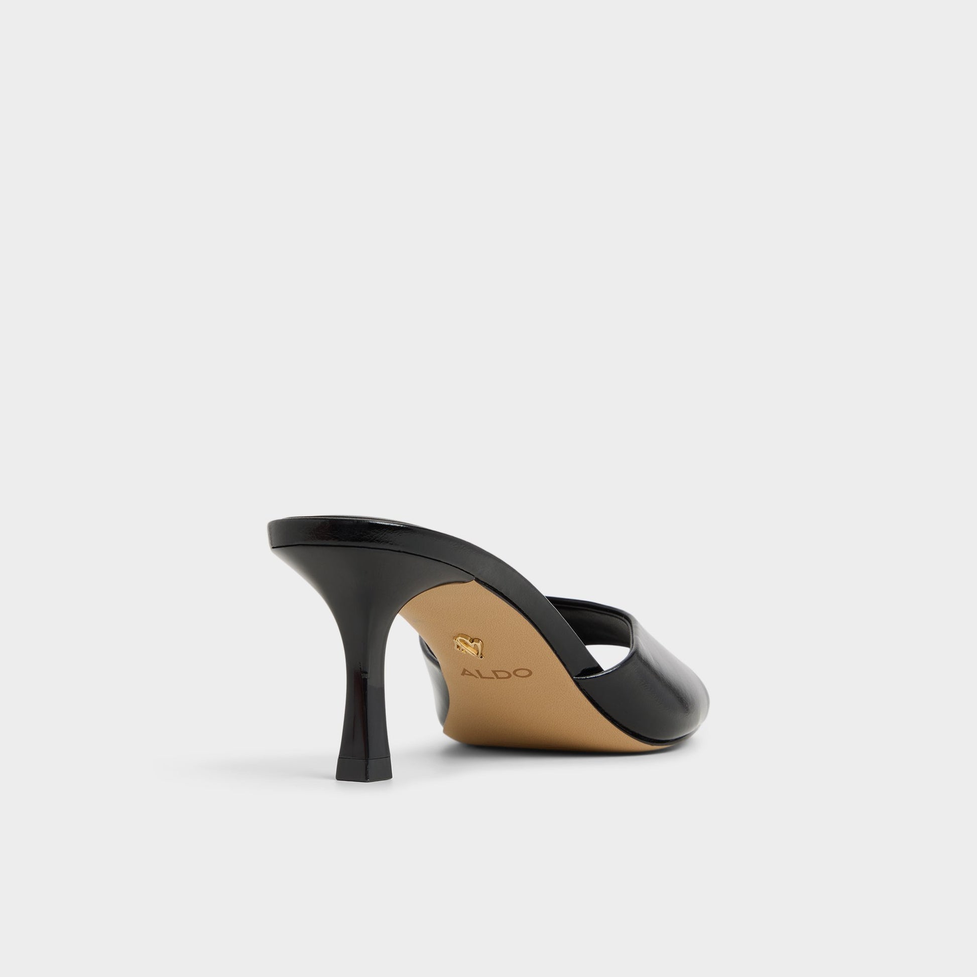 Three-quarter angle of Black Annaberaen Heeled mule's back side