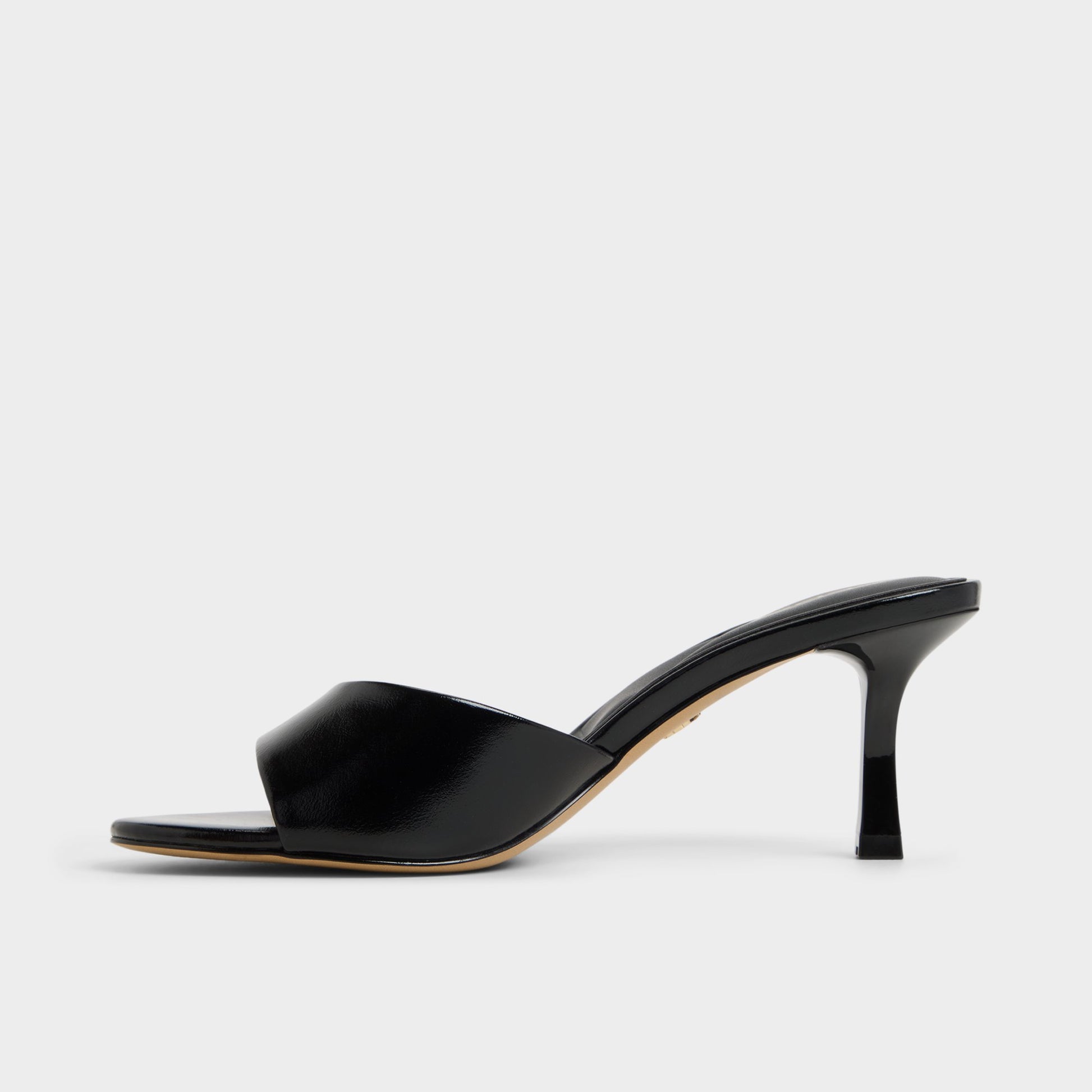 Side view of Black Annaberaen Heeled mule