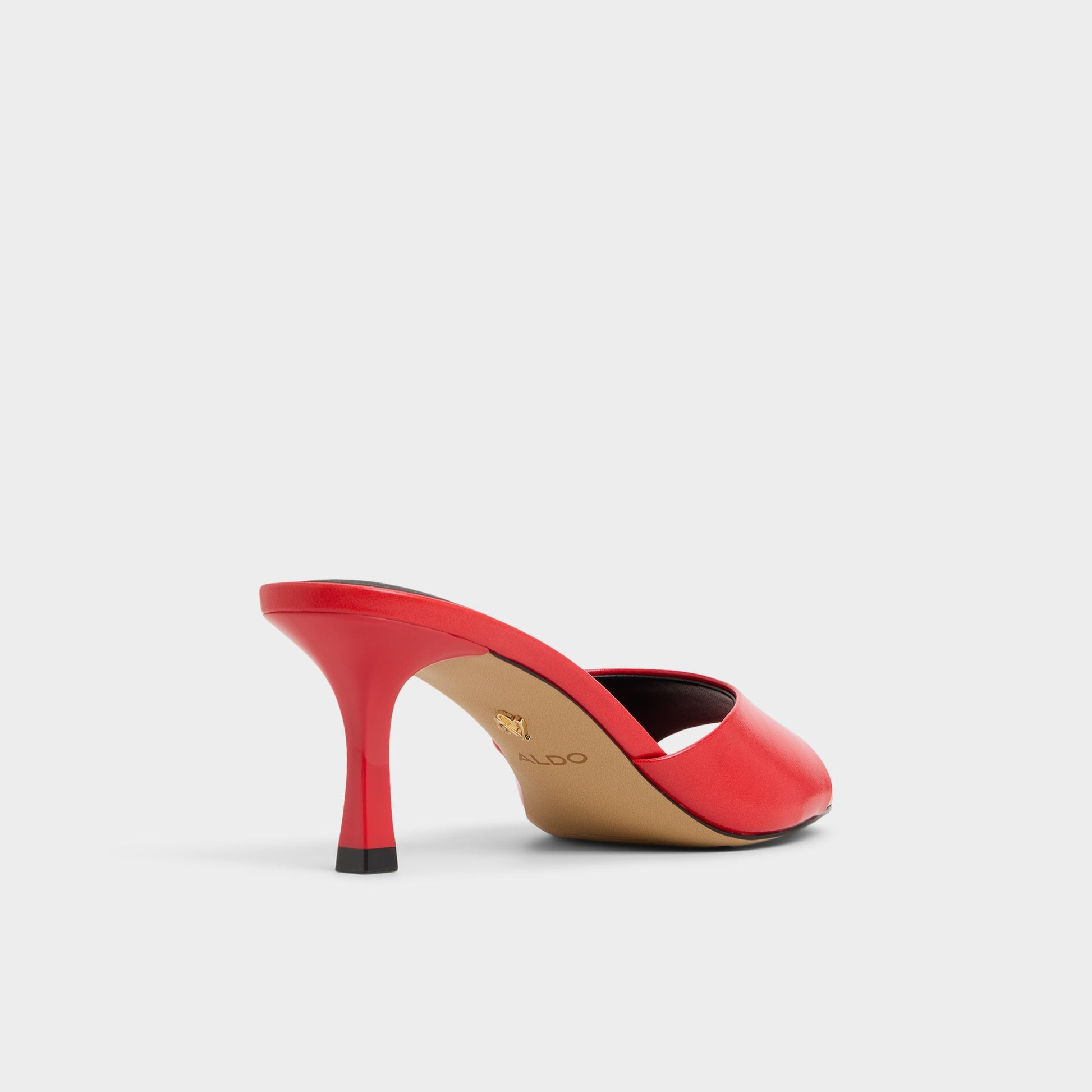 Three-quarter angle of Bright red Annaberaen Heeled mule's back side